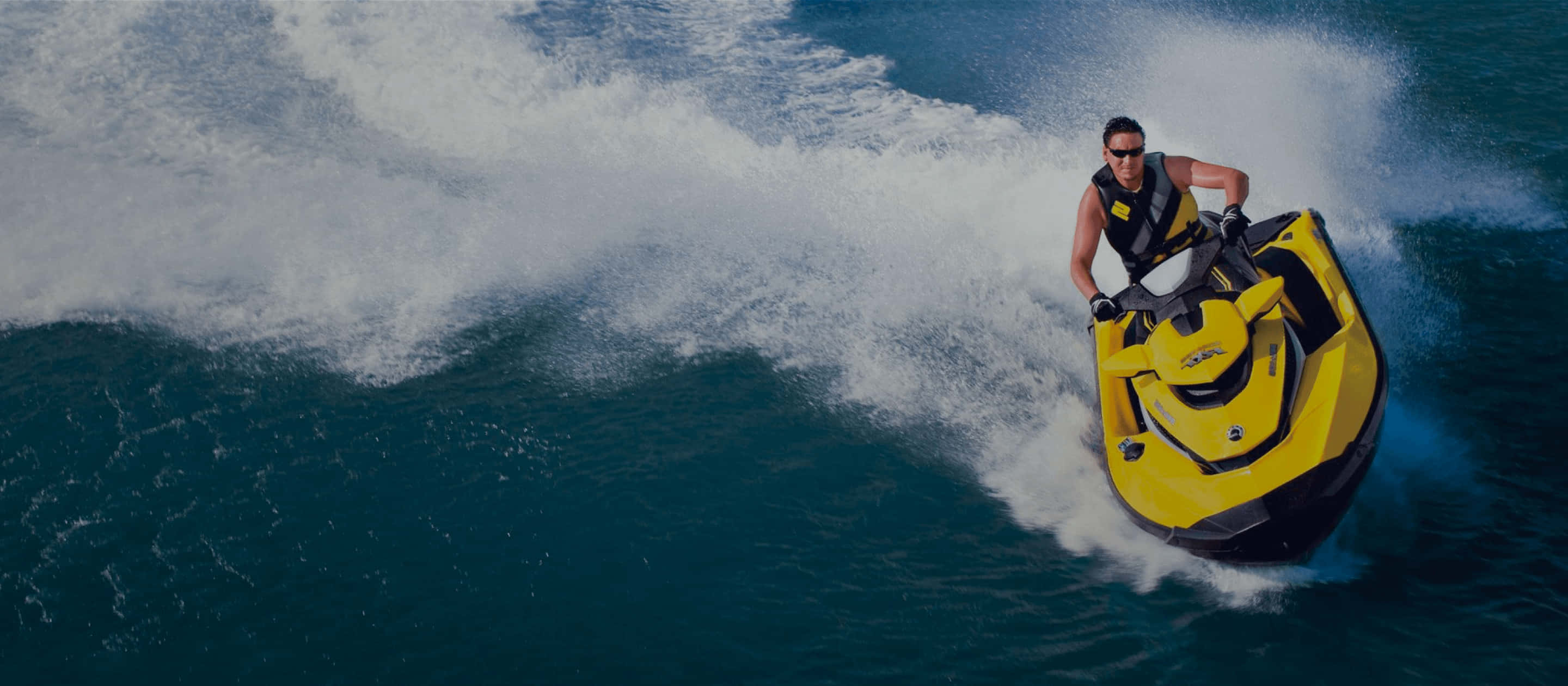 yellow jet ski, bright yellow, deep blue ocean water, 2K Desktop Wallpaper