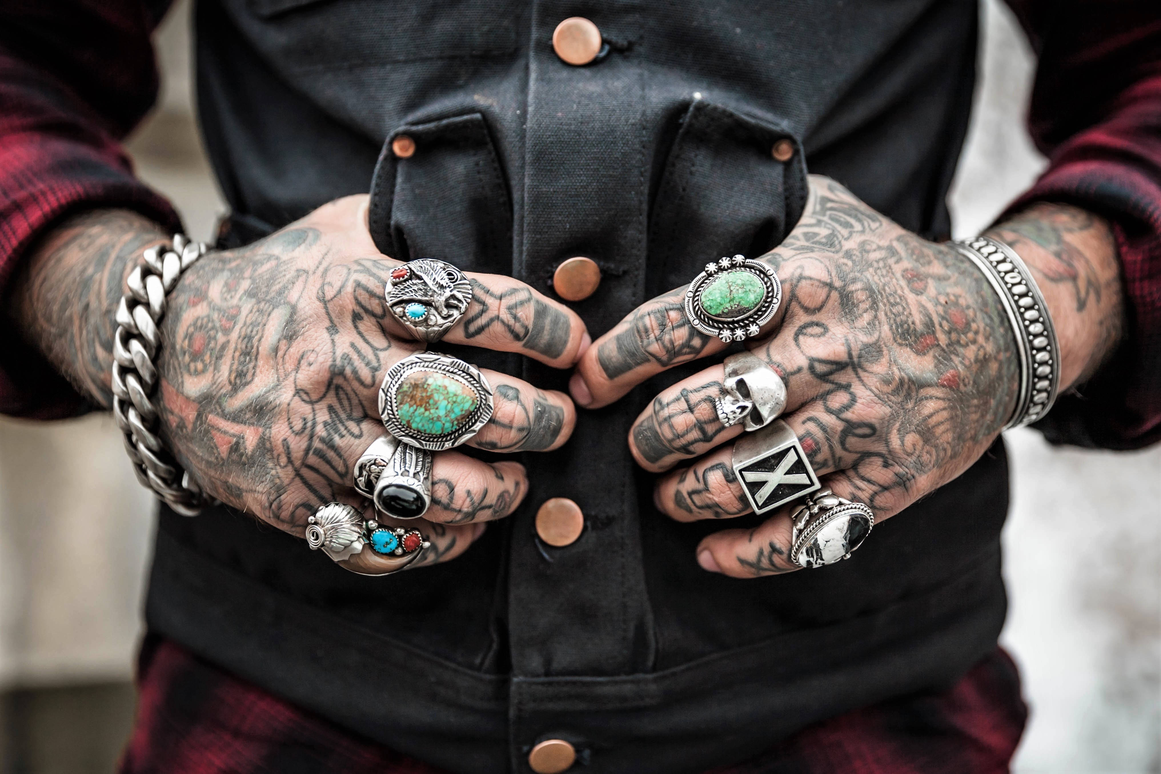 tattooed hands, multiple ornate rings, thick bracelets, 4K Desktop Wallpaper