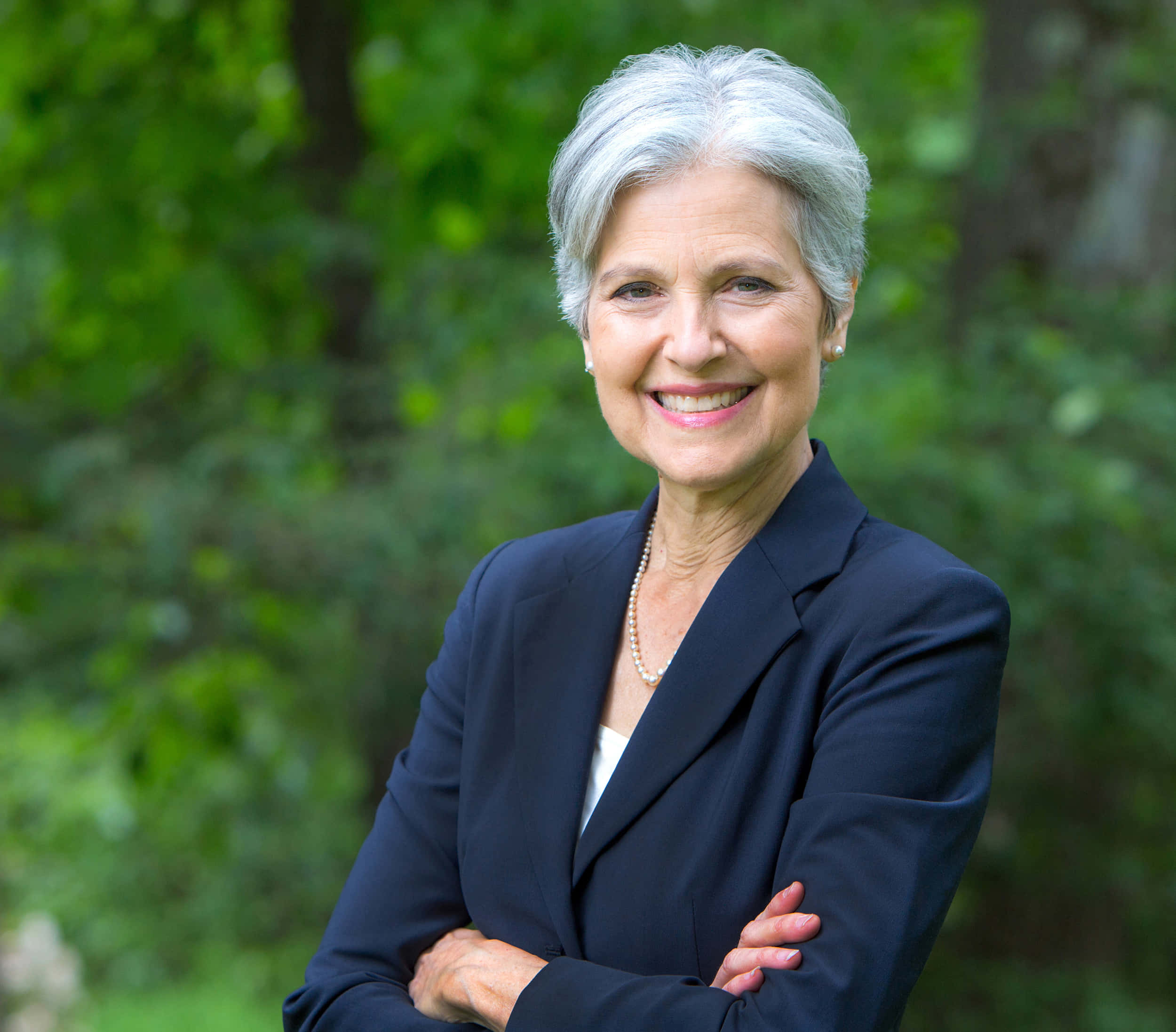 Jill Stein, arms crossed pose, short gray hair, Full HD Desktop Wallpaper