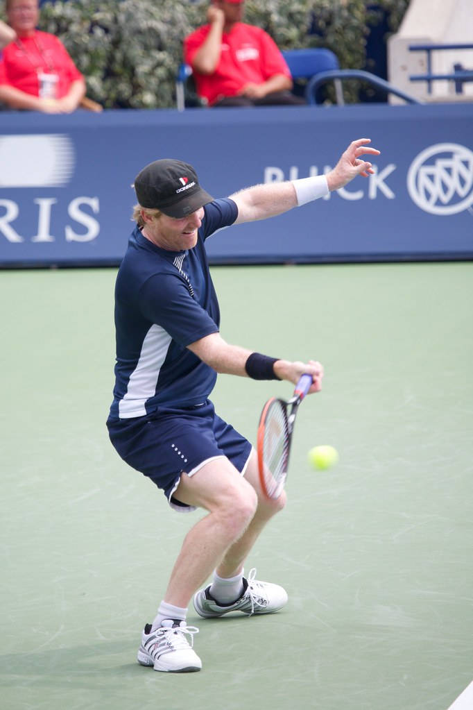Jim Courier, navy gear, bright yellow ball, SD Phone Wallpaper