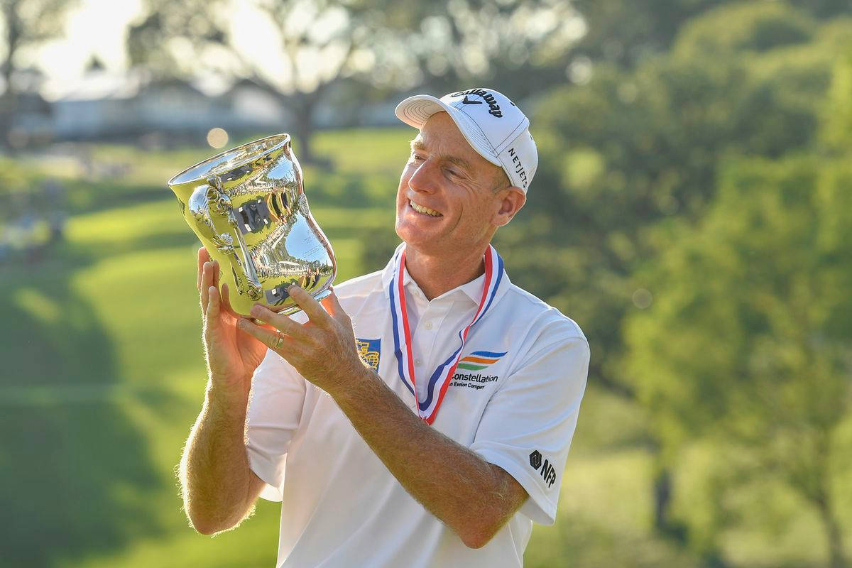 Jim Furyk, gleaming trophy, sunlit green golf course, SD Desktop Wallpaper
