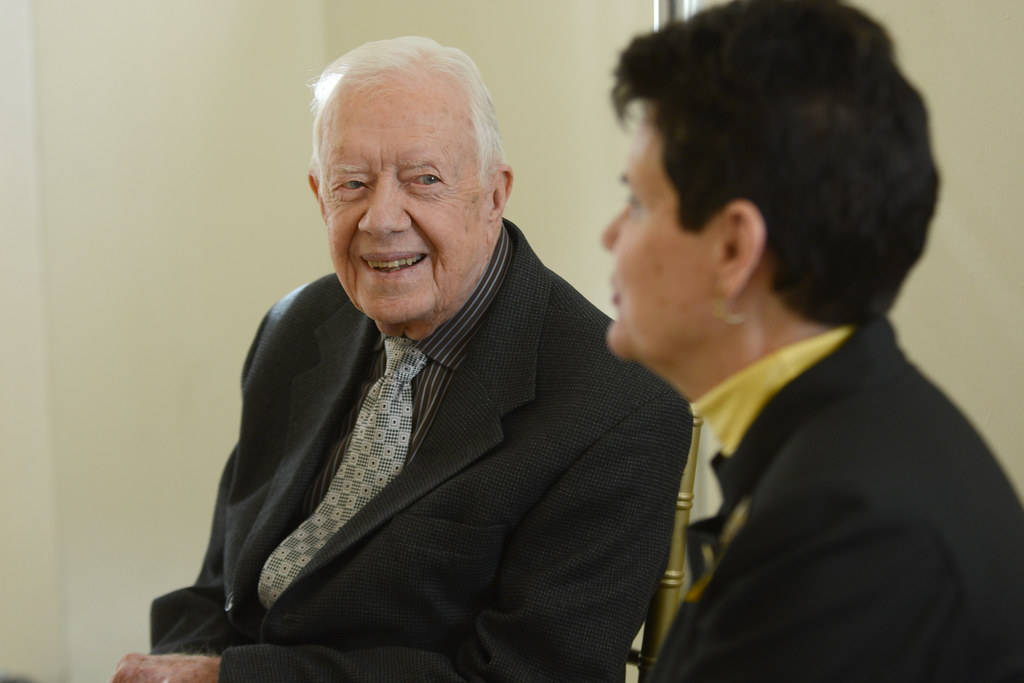 Jimmy Carter, dark suit, woman in profile, SD Desktop Wallpaper