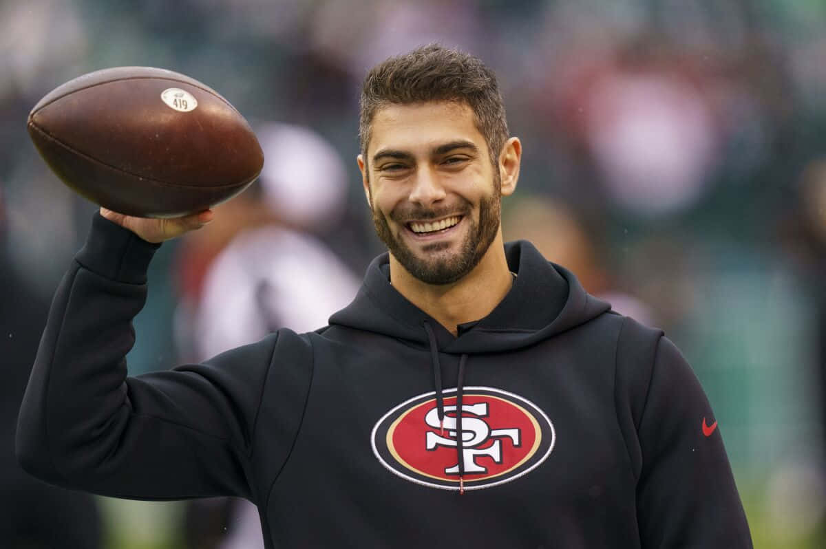 Jimmy Garoppolo, black hoodie, brown football, SD Desktop Wallpaper