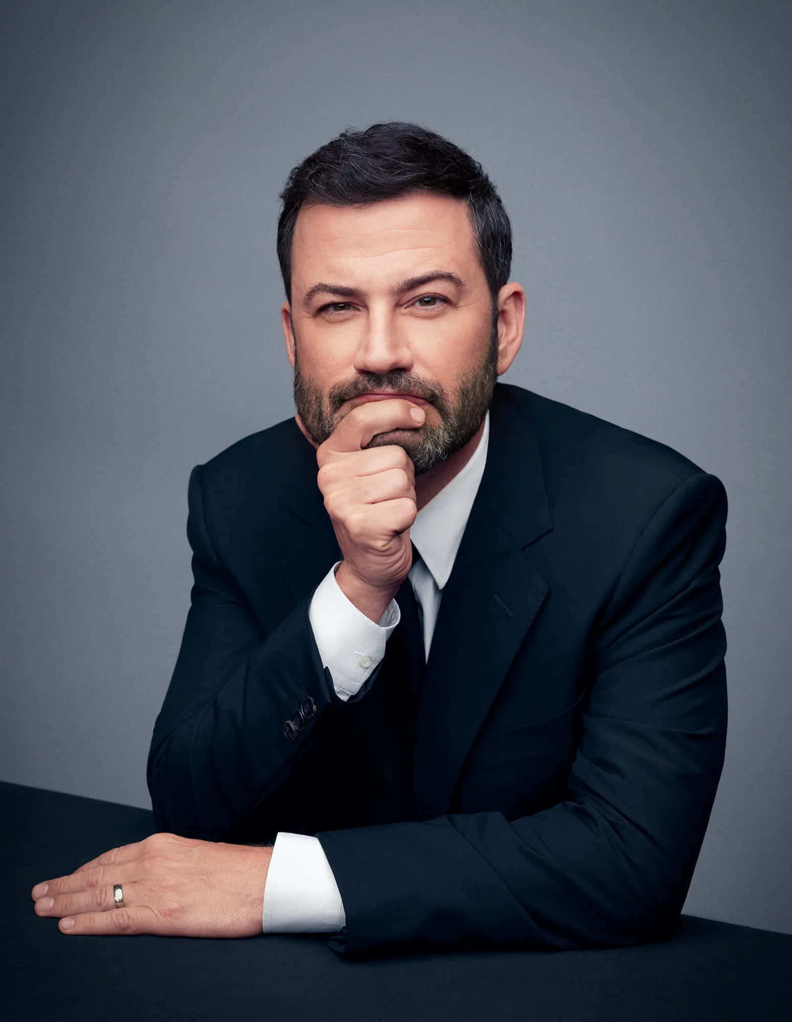 Jimmy Kimmel, dark suit, muted gray backdrop, Full HD Phone Wallpaper