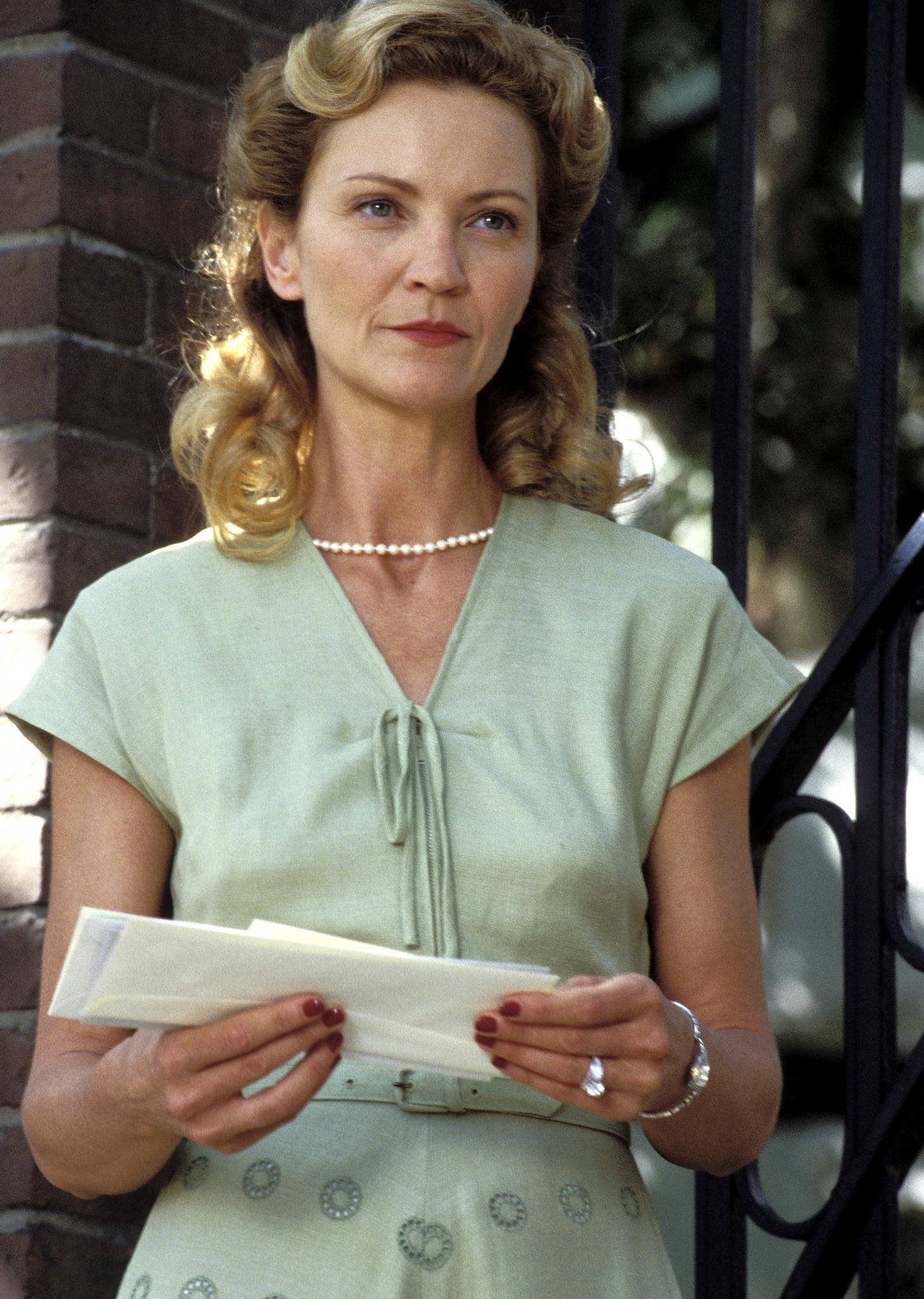 Joan Allen, light green dress, brick wall, Full HD Phone Wallpaper