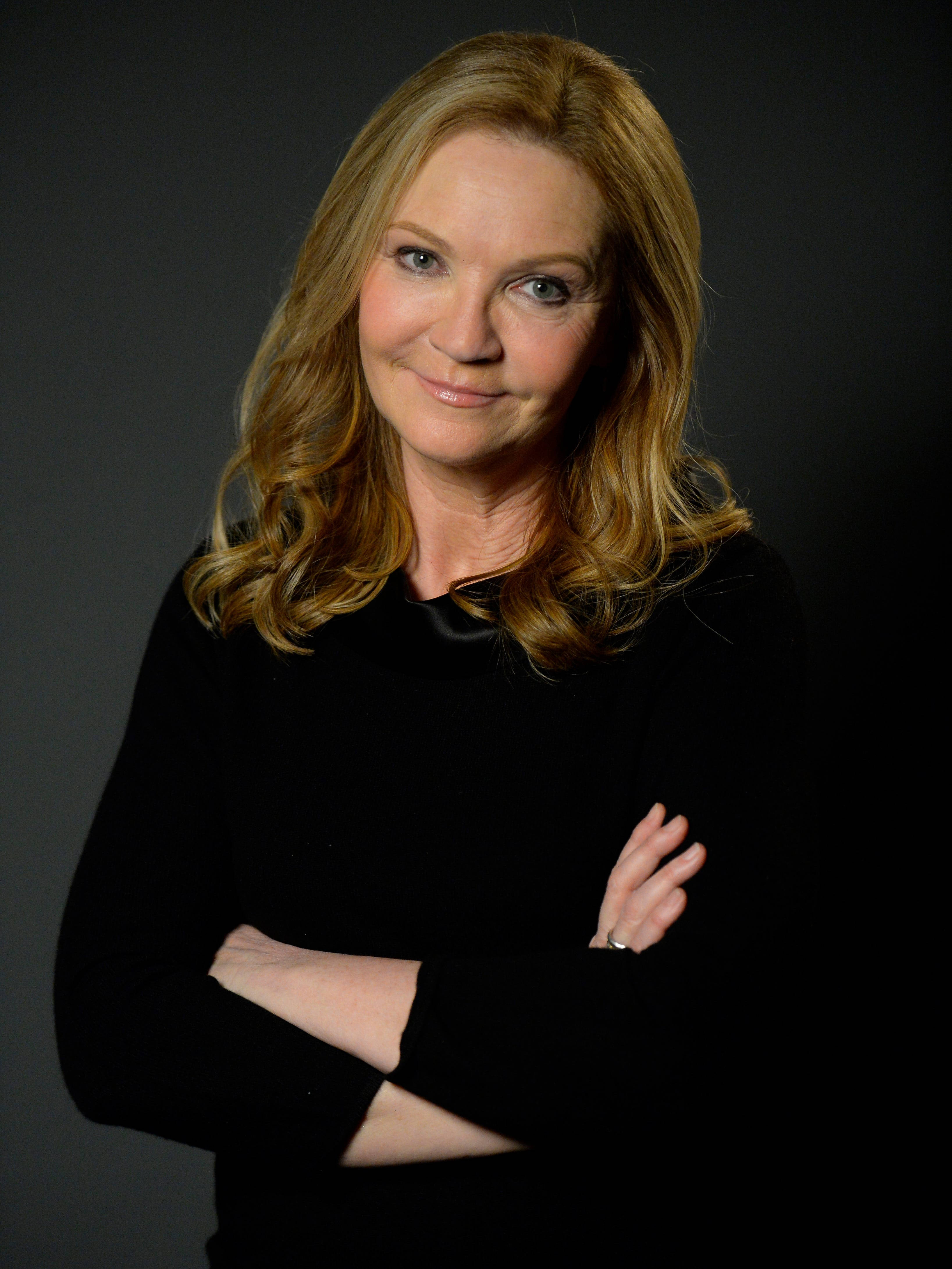 Joan Allen, wavy blonde hair, gentle smile, 4K Phone Wallpaper