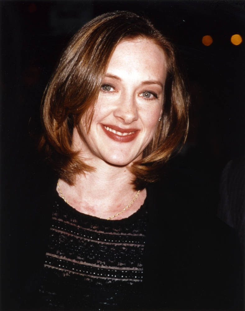 Joan Cusack, shoulder-length brown hair, warm smile, SD Phone Wallpaper