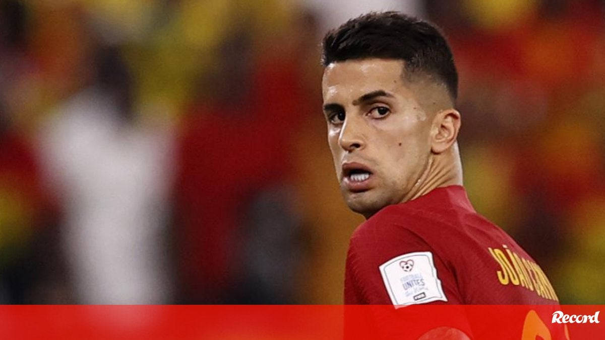 Joao Cancelo, red jersey, stadium lights, SD Desktop Wallpaper