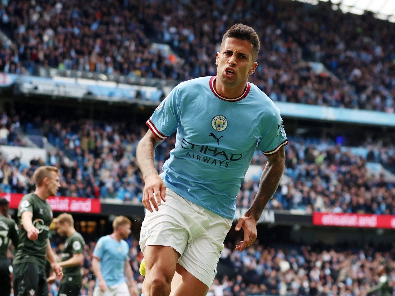 Joao Cancelo, light blue Manchester City jersey, daytime match, HD Desktop Wallpaper