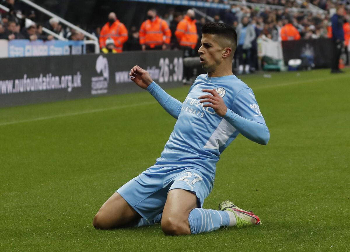 Joao Cancelo, light blue kit, vibrant green grass, SD Desktop Wallpaper