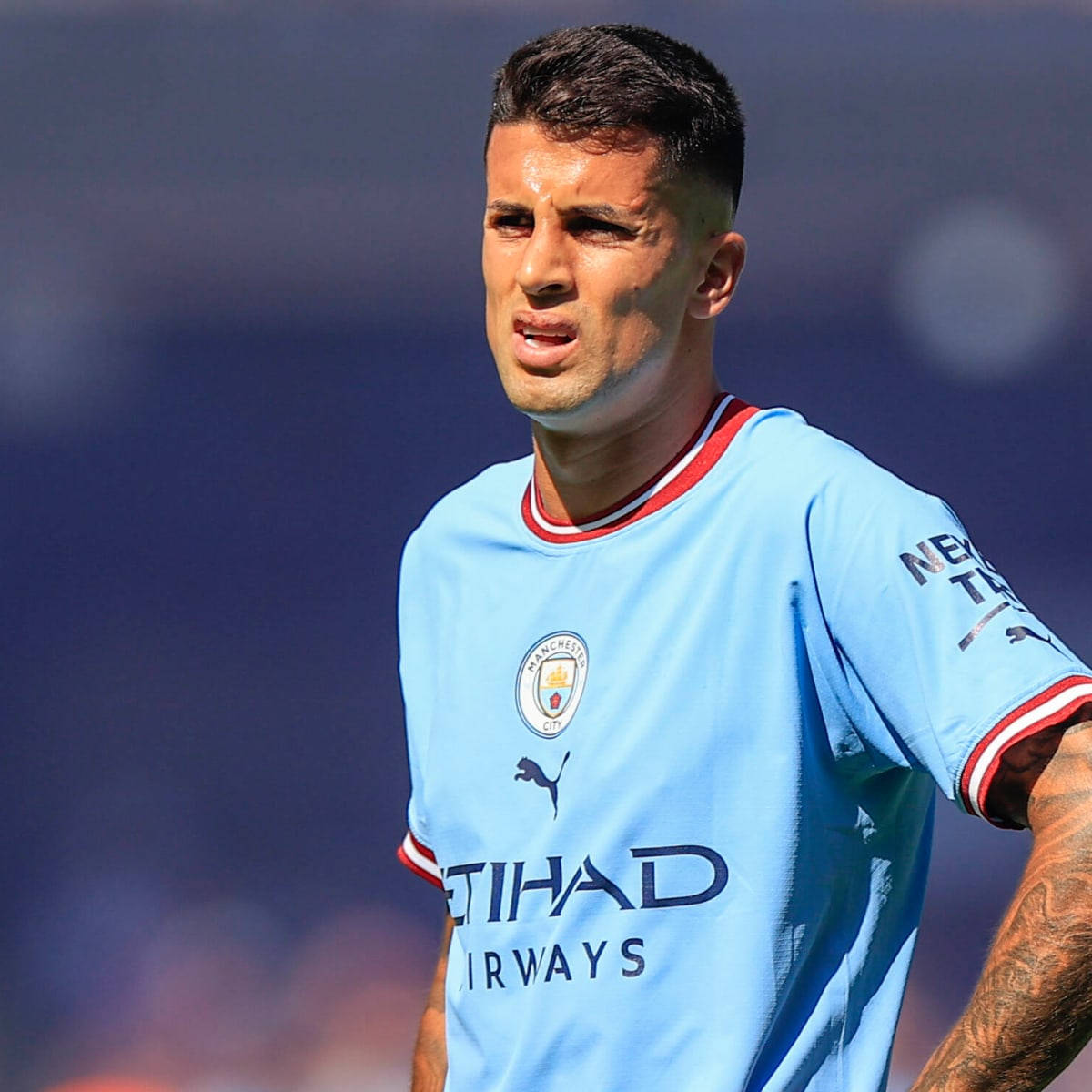 Joao Cancelo, light blue Manchester City jersey, tattoos on his arm, SD Desktop Wallpaper