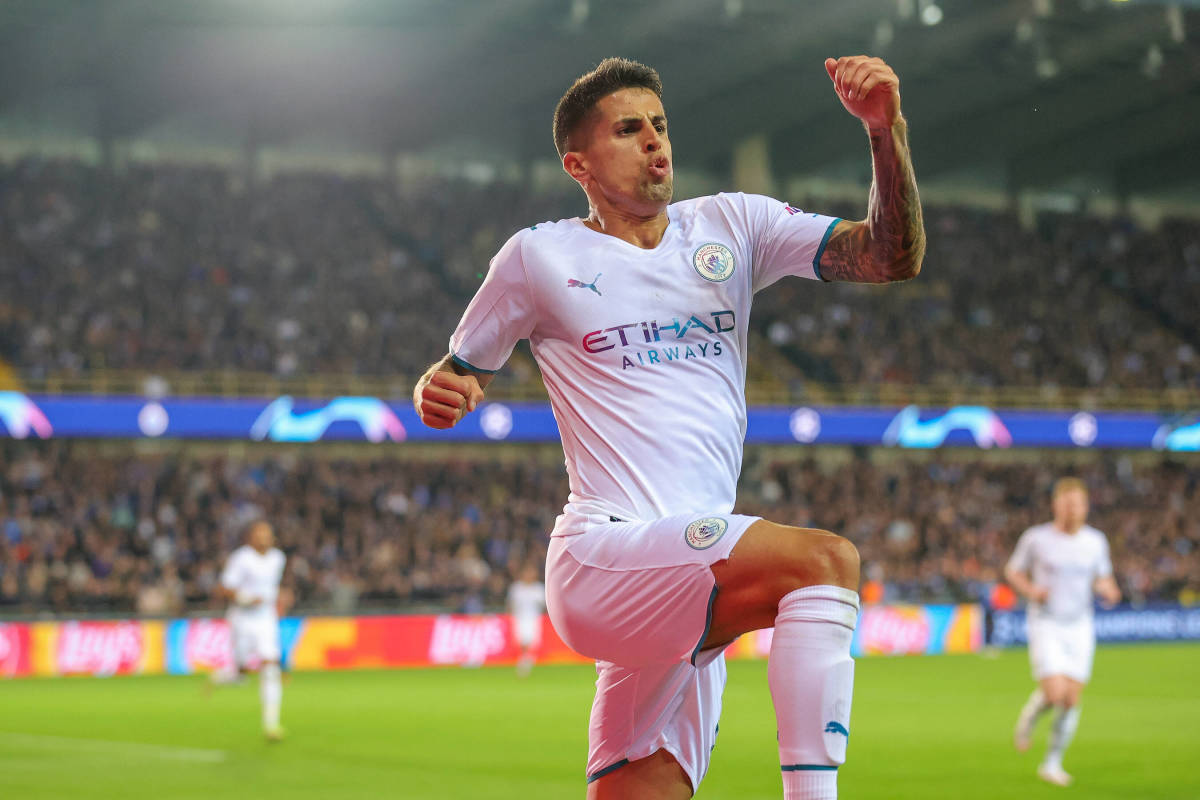 Joao Cancelo, white Manchester City kit, raised fist, SD Desktop Wallpaper