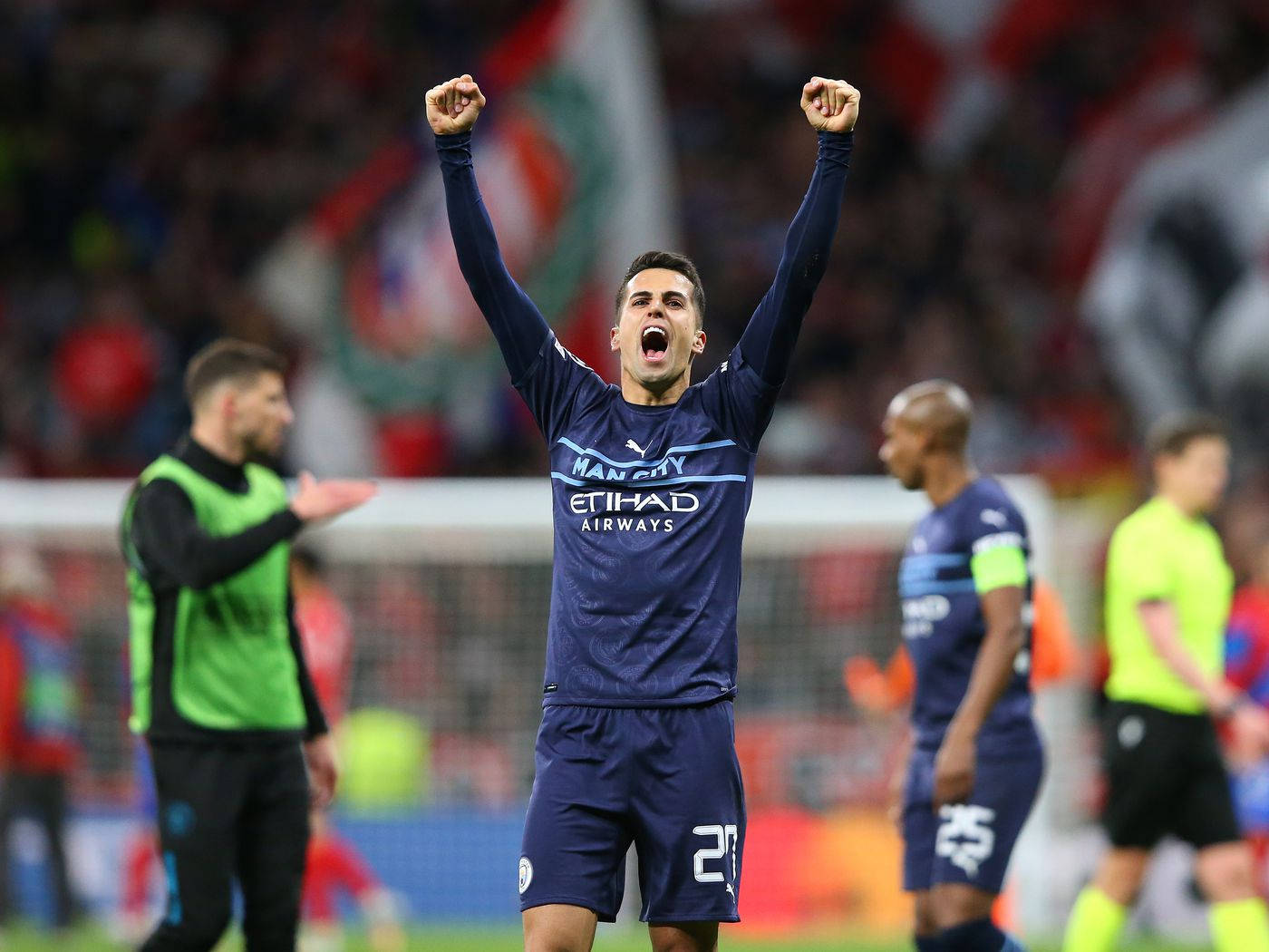 Joao Cancelo, blue Manchester City jersey, stadium field, HD Desktop Wallpaper