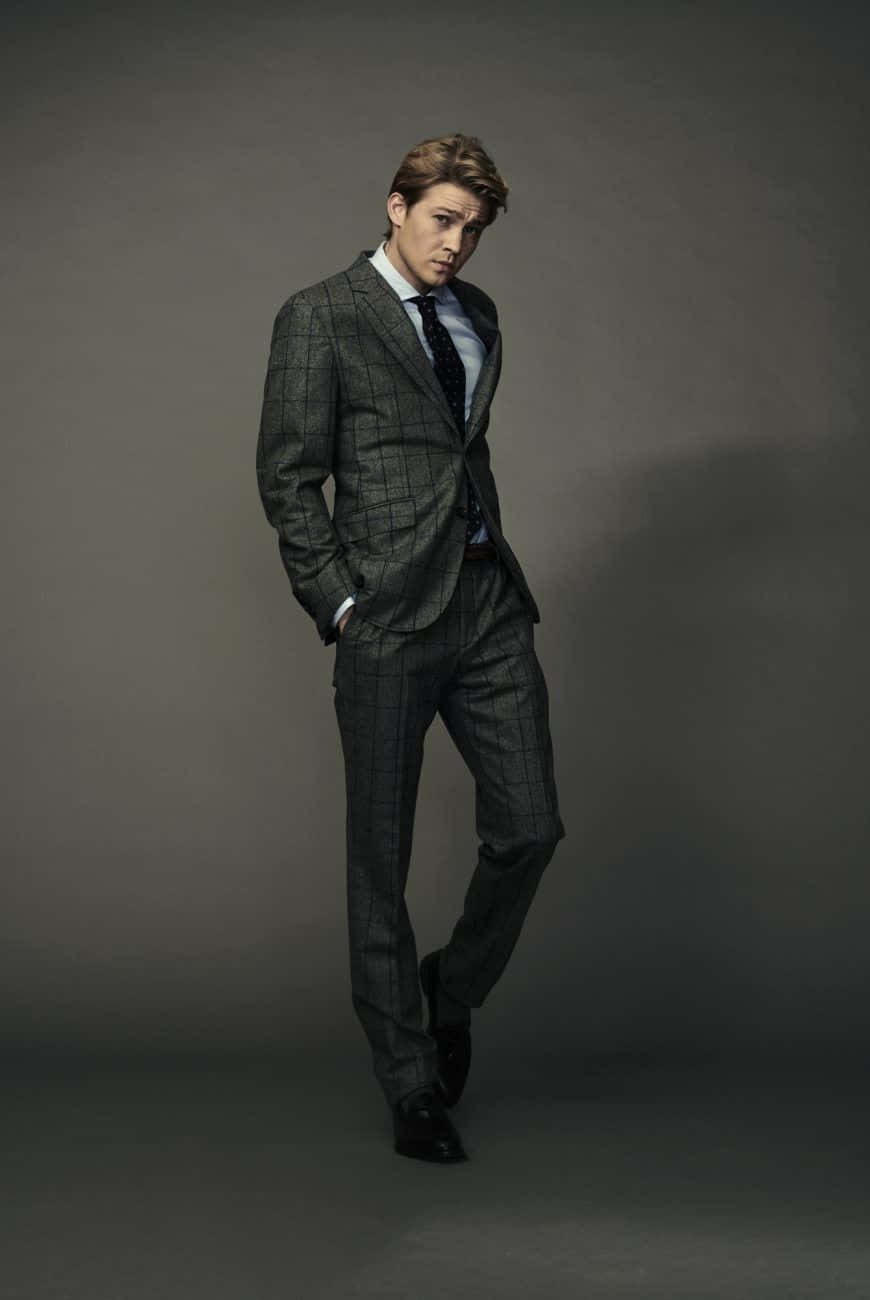 Joe Alwyn, grey plaid suit, muted grey studio backdrop, HD Phone Wallpaper