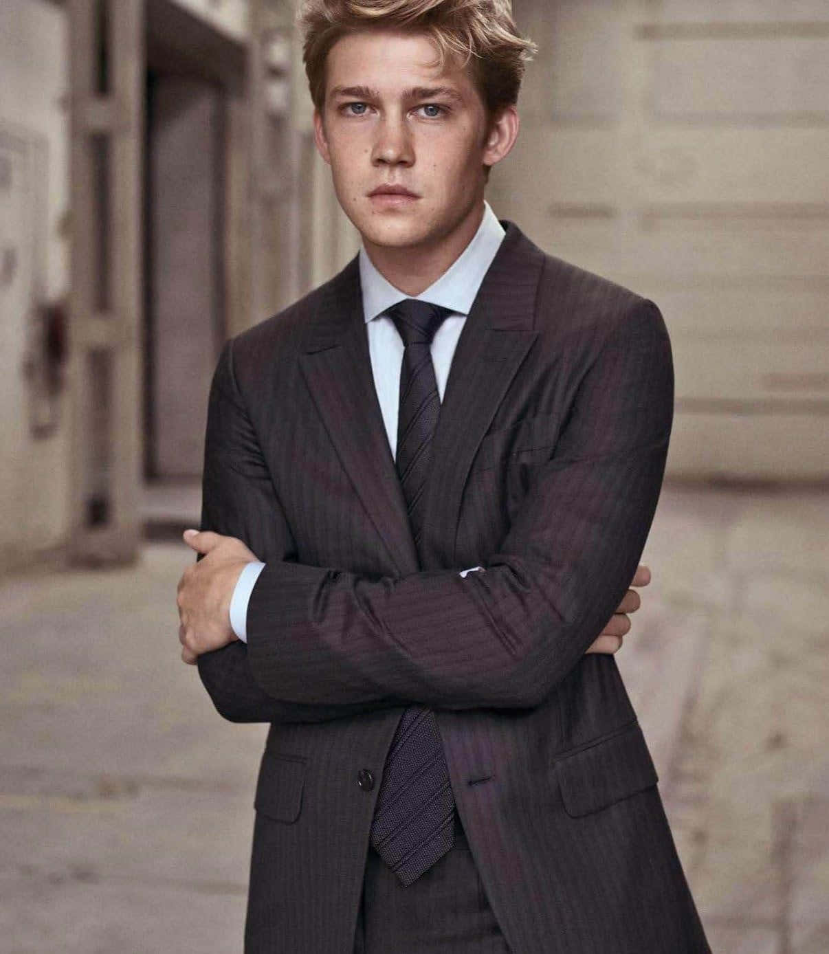 Joe Alwyn, pinstripe suit, urban alleyway, HD Phone Wallpaper