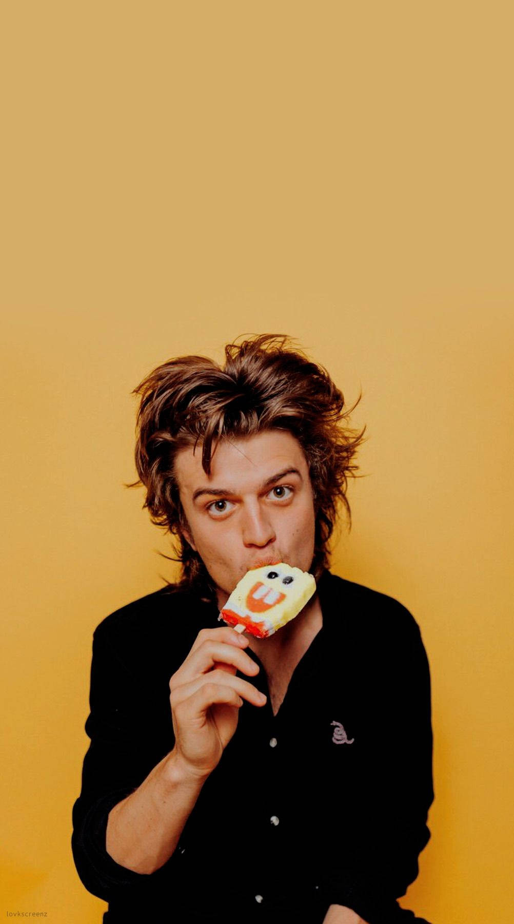 Joe Keery, popsicle, mustard-yellow background, HD Phone Wallpaper