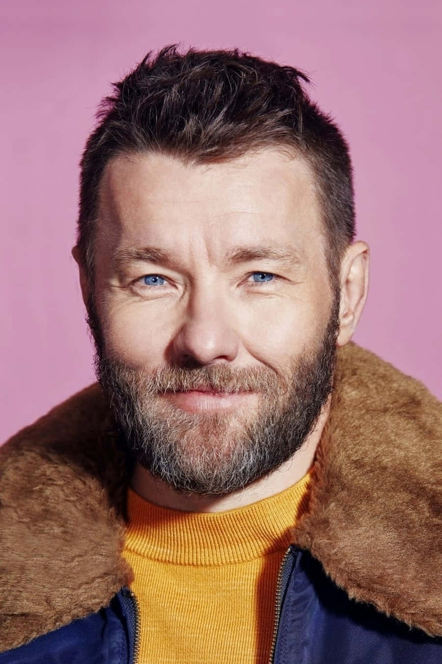 Joel Edgerton, pink background, fur-lined jacket, HD Phone Wallpaper