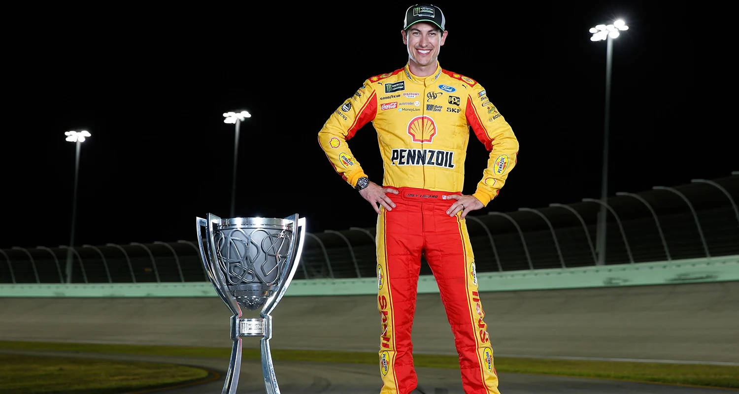 Joey Logano, yellow and red uniform, silver trophy, HD Desktop Wallpaper
