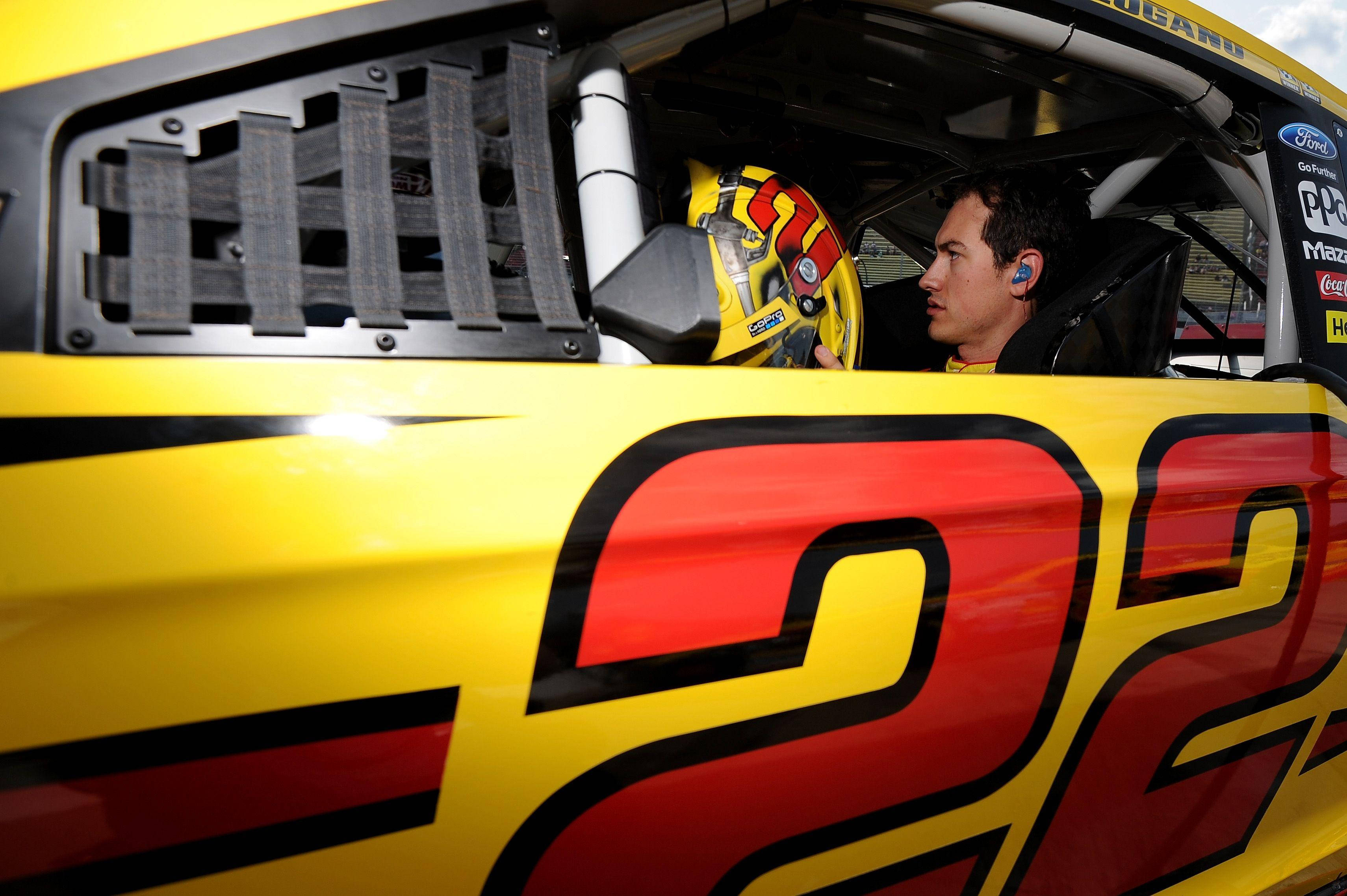 Joey Logano, yellow helmet, bright yellow race car, 2K Desktop Wallpaper