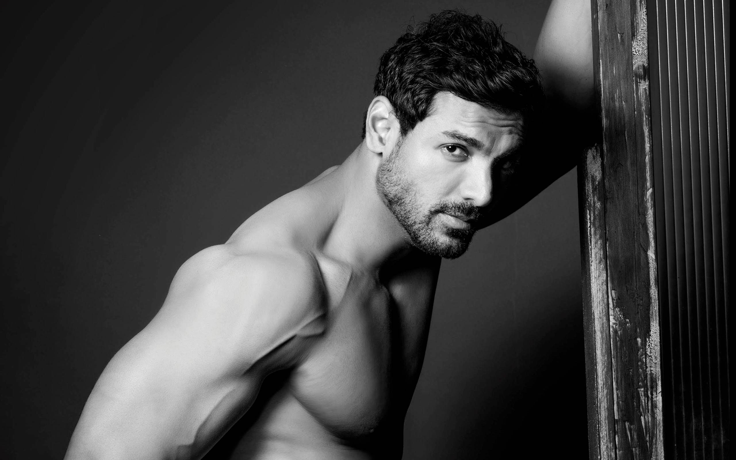 John Abraham, black and white studio portrait, muscular man, 2K Desktop Wallpaper