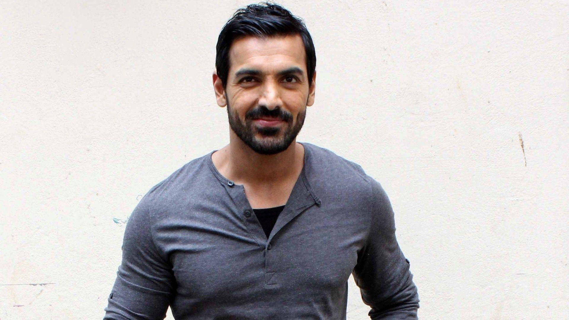 John Abraham, gray henley shirt, off-white wall, Full HD Desktop Wallpaper