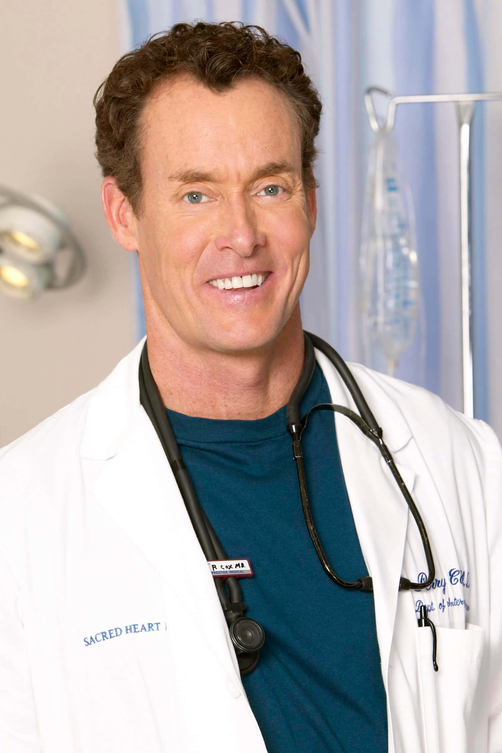 John C. Mcginley, white lab coat, stethoscope, 2K Phone Wallpaper