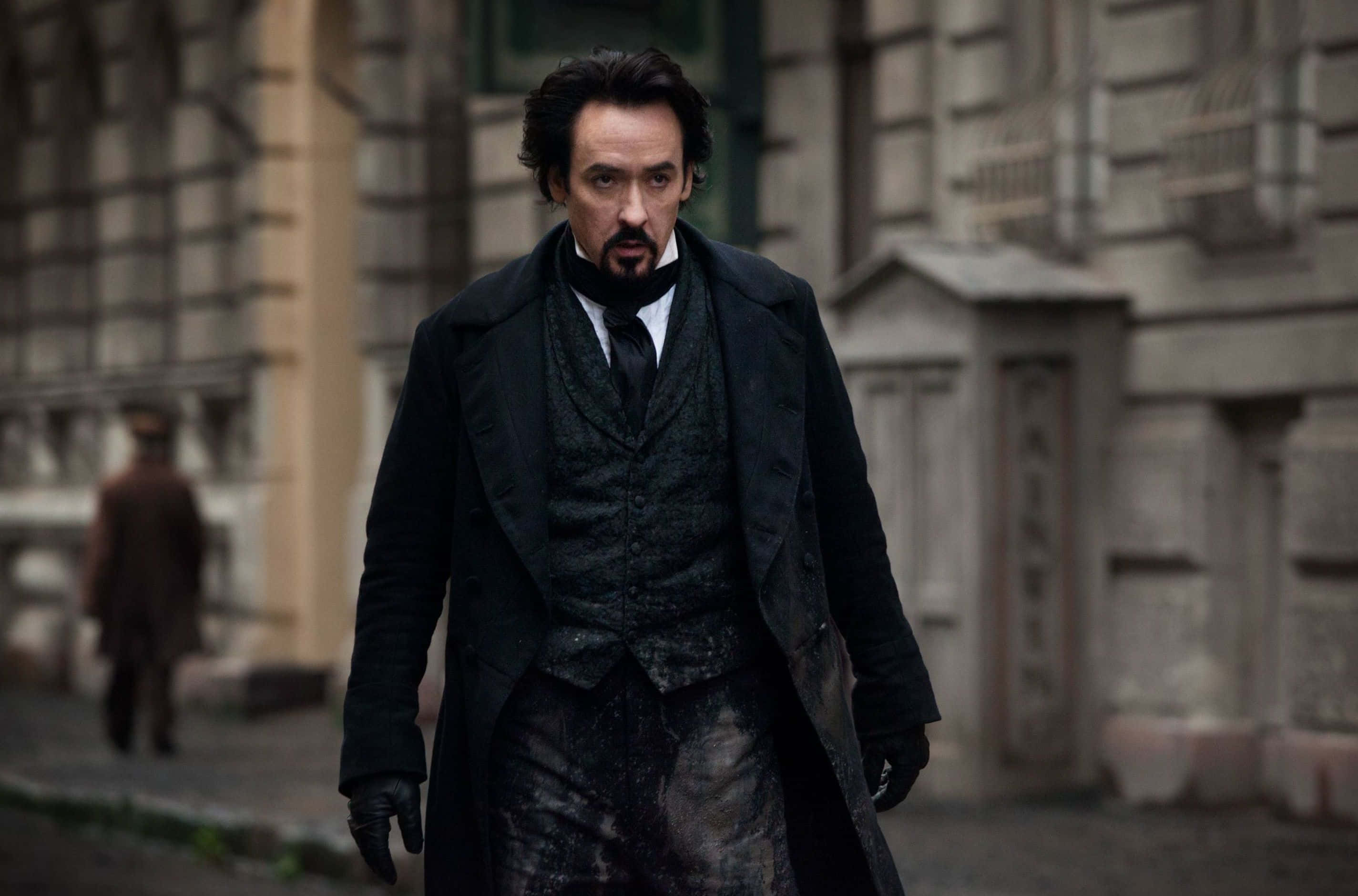John Cusack, dark Victorian coat, grimy urban street, 2K Desktop Wallpaper