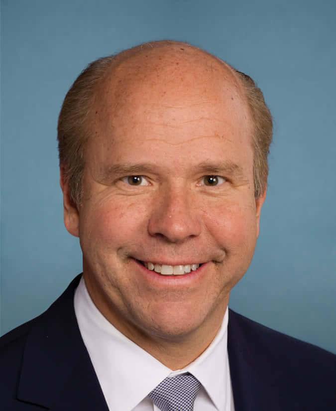 John Delaney, dark suit, patterned tie, SD Phone Wallpaper