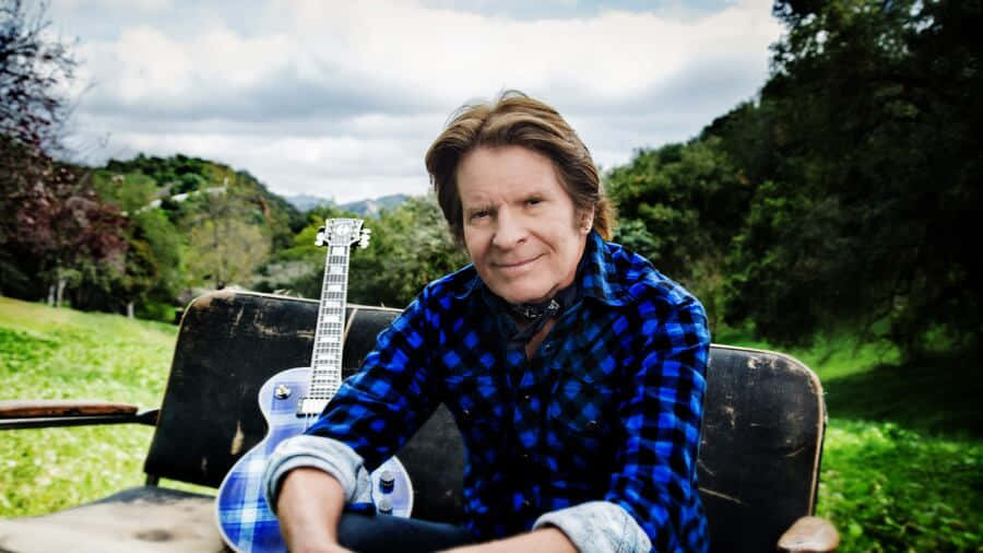 John Fogerty, blue plaid shirt, weathered bench, SD Desktop Wallpaper