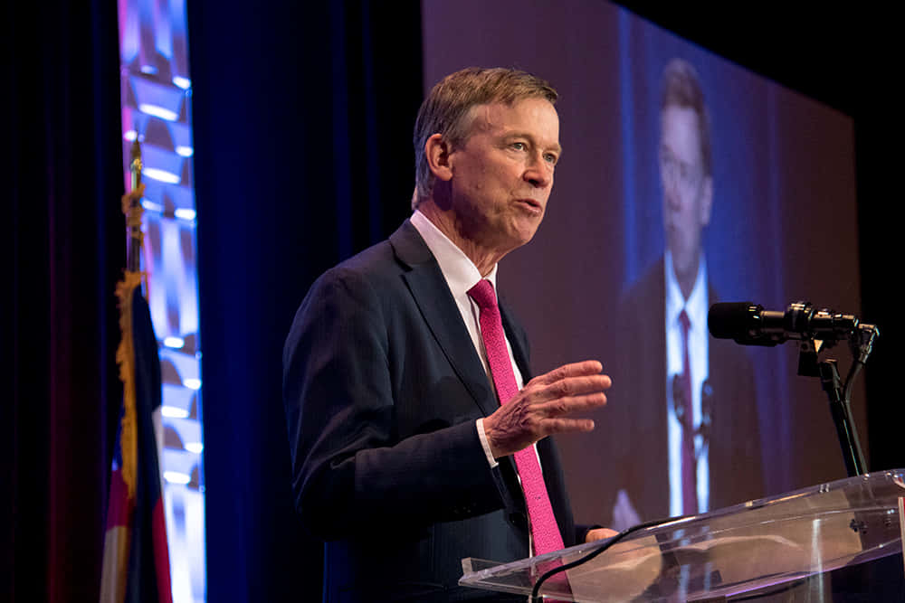John Hickenlooper, podium, stage lights, SD Desktop Wallpaper