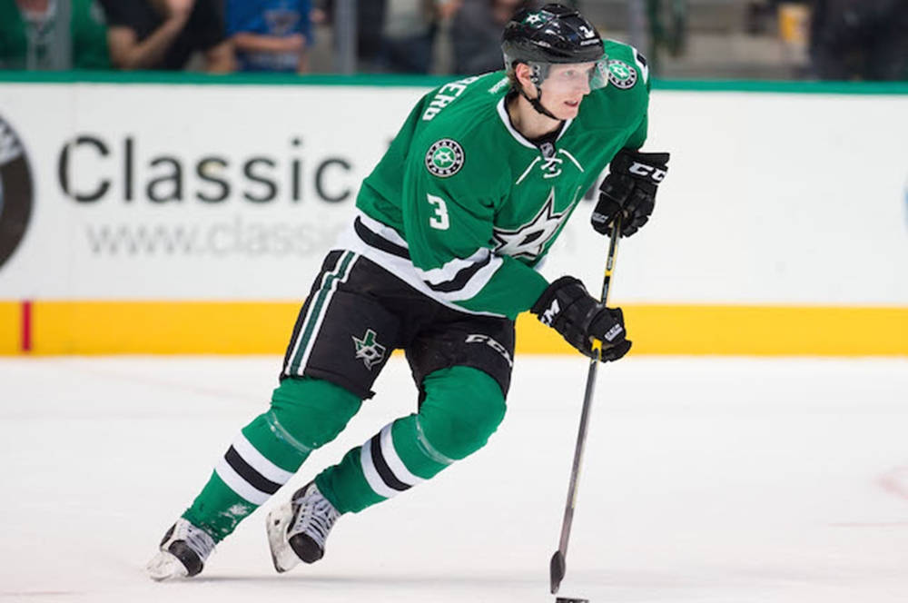 John Klingberg, green and black uniform, skating on ice, SD Desktop Wallpaper