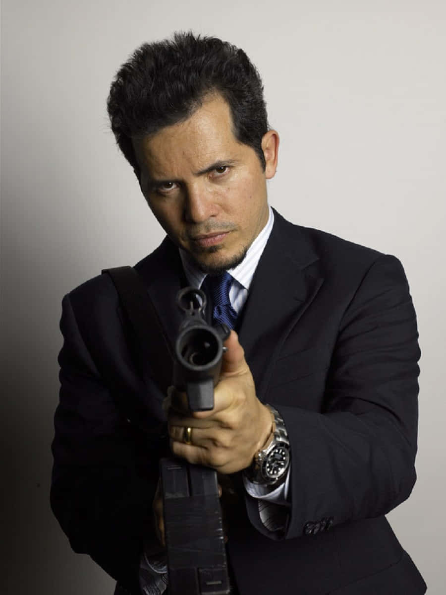 John Leguizamo, dark suit, pistol, SD Phone Wallpaper