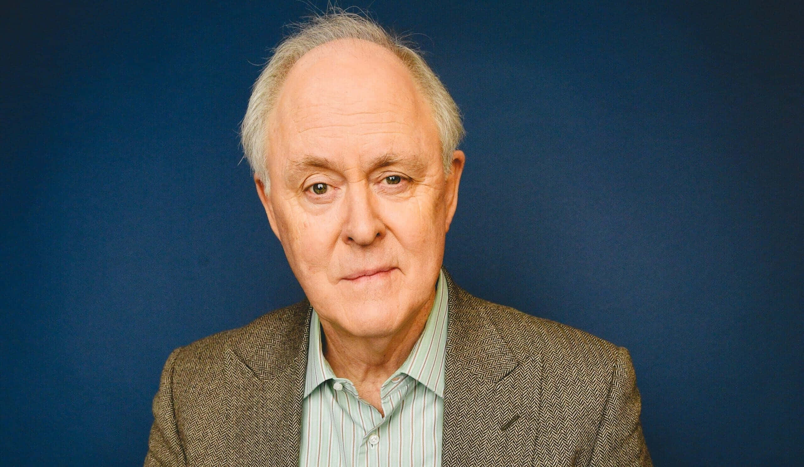 John Lithgow, brown tweed jacket, striped shirt, 2K Desktop Wallpaper