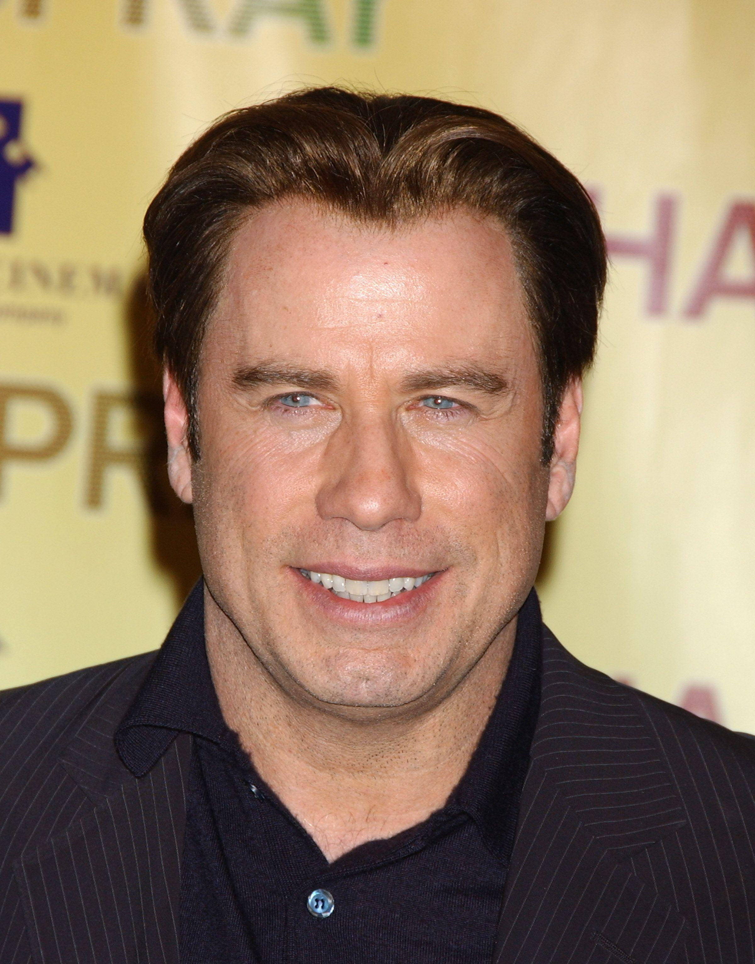 John Travolta, dark pinstripe suit jacket, dark polo shirt, 2K Phone Wallpaper
