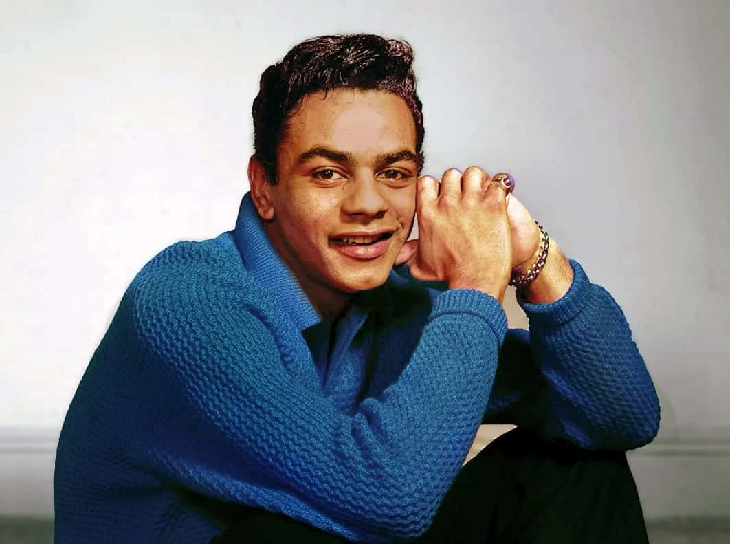 Johnny Mathis, textured blue sweater, ring, SD Desktop Wallpaper