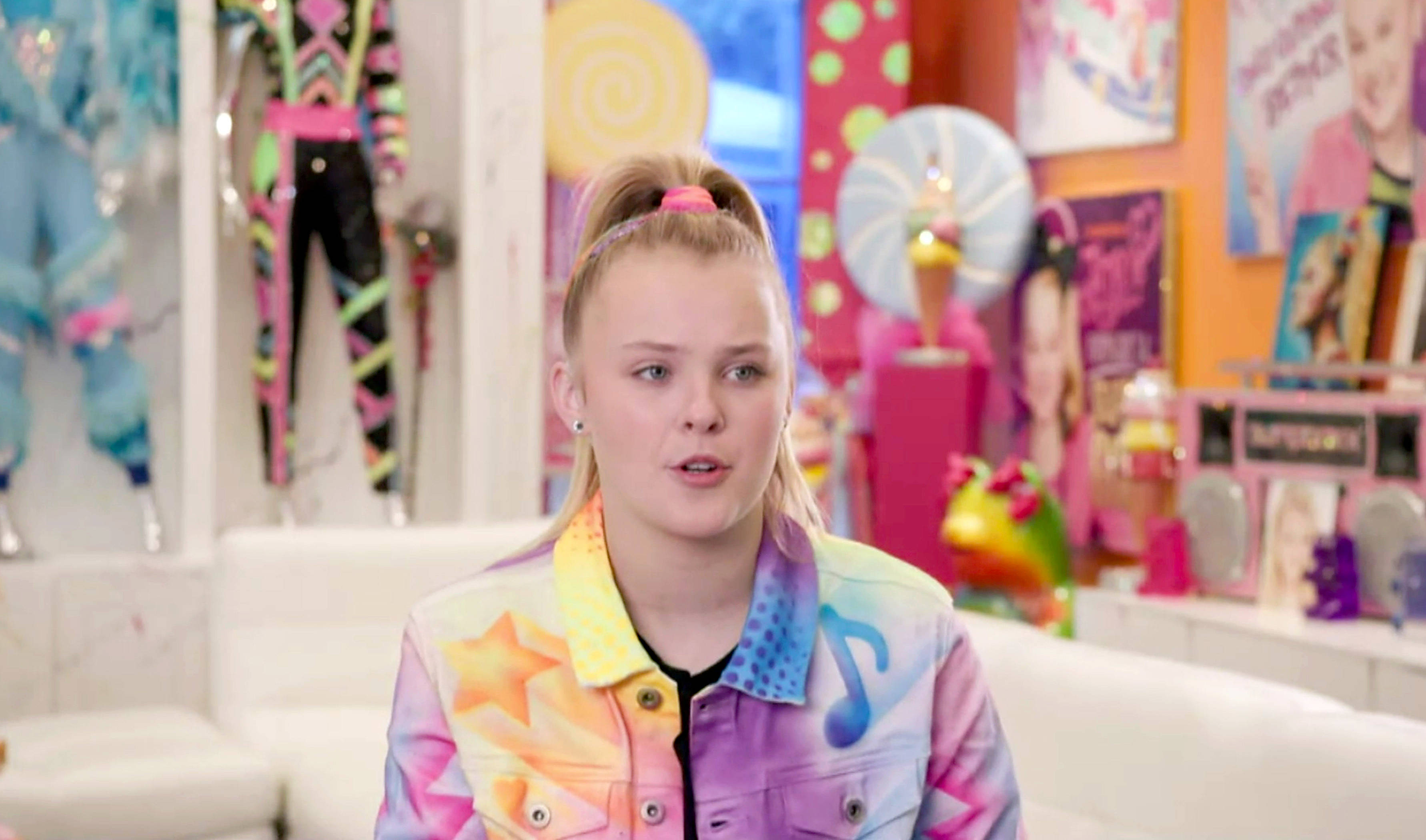Jojo Siwa, pigtails, colorful jacket with stars and musical notes, 2K Desktop Wallpaper