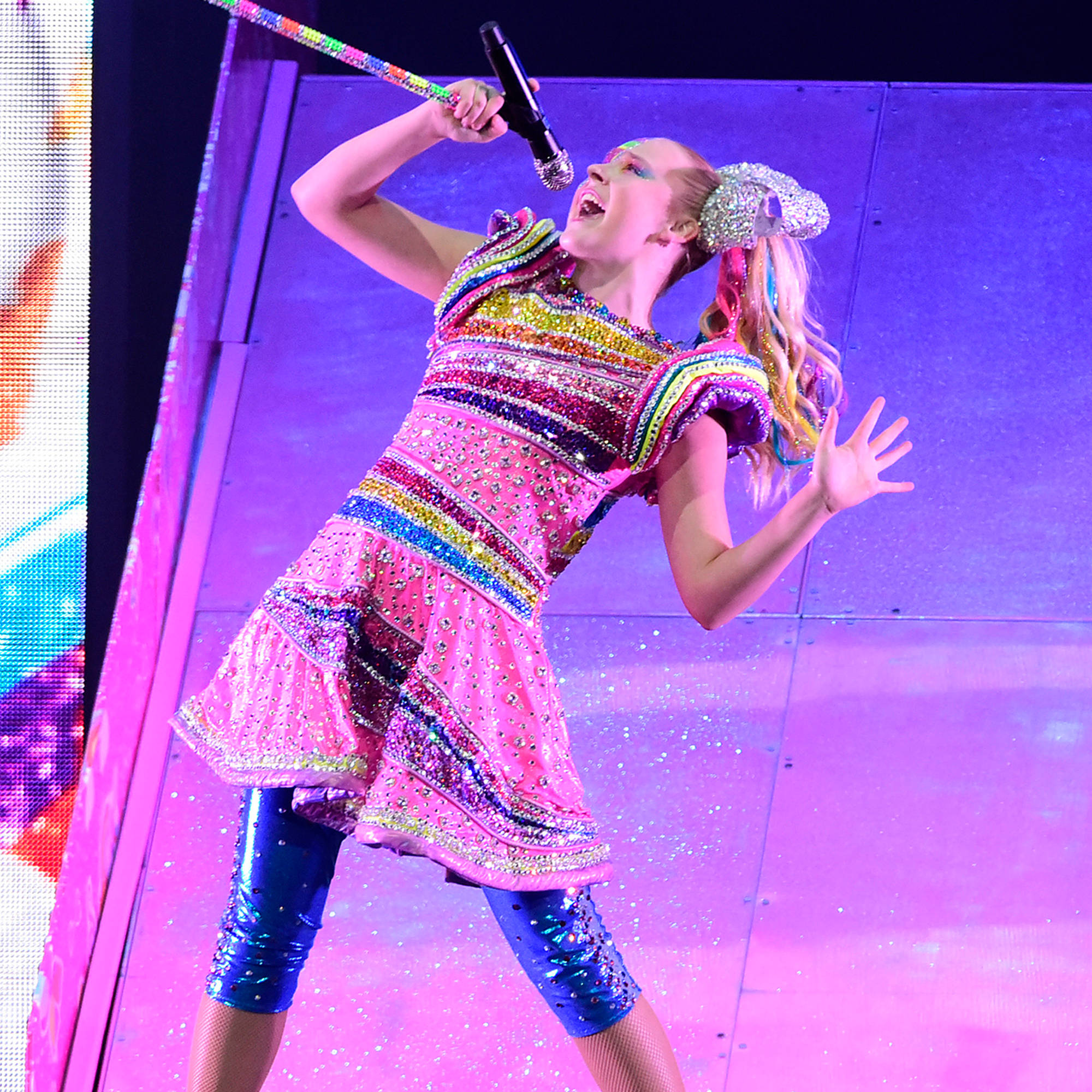 Jojo Siwa, rainbow outfit, purple-lit stage, Full HD Desktop Wallpaper