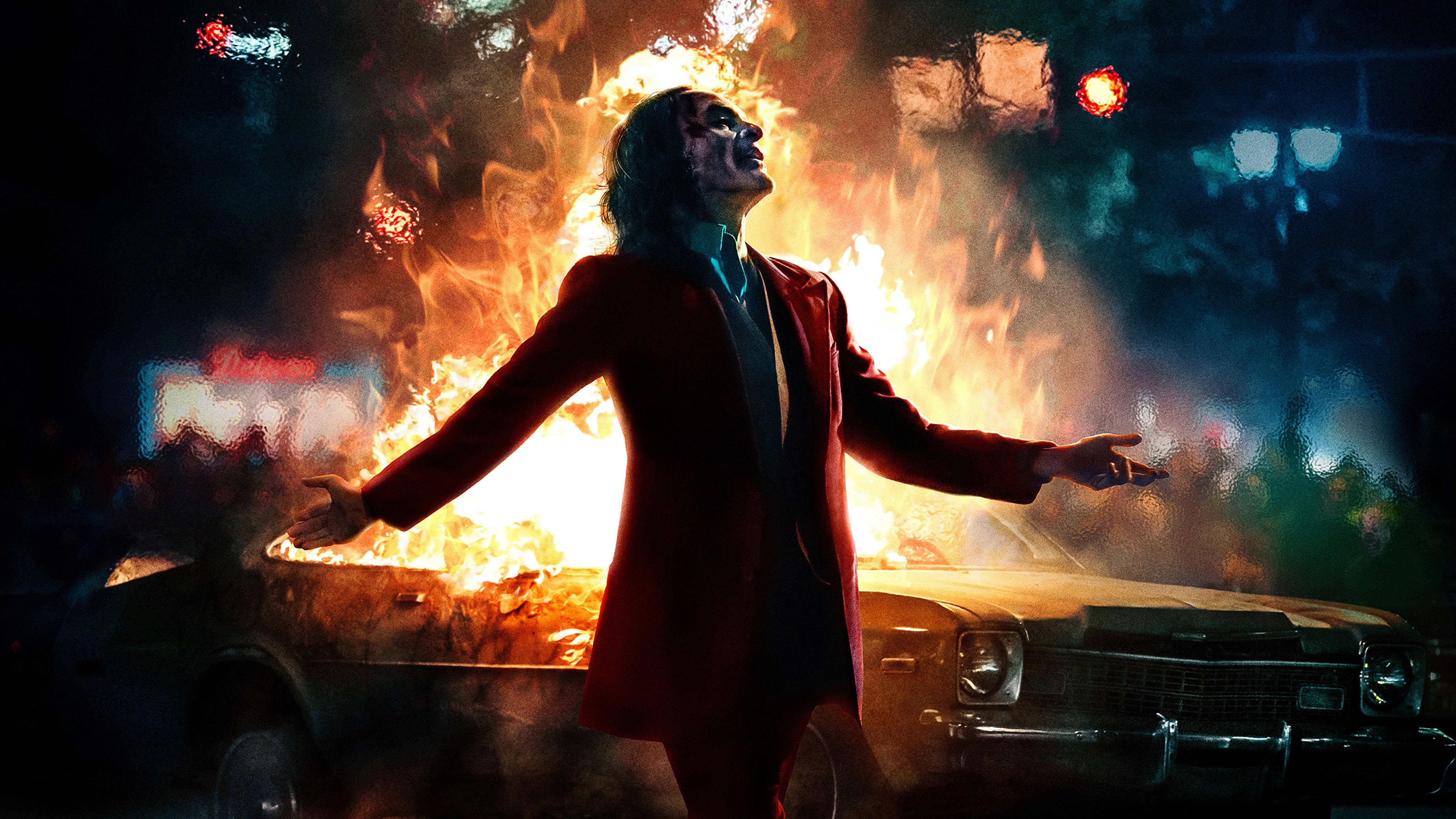 Joker 2019, red suit, burning car, 5K Desktop Wallpaper