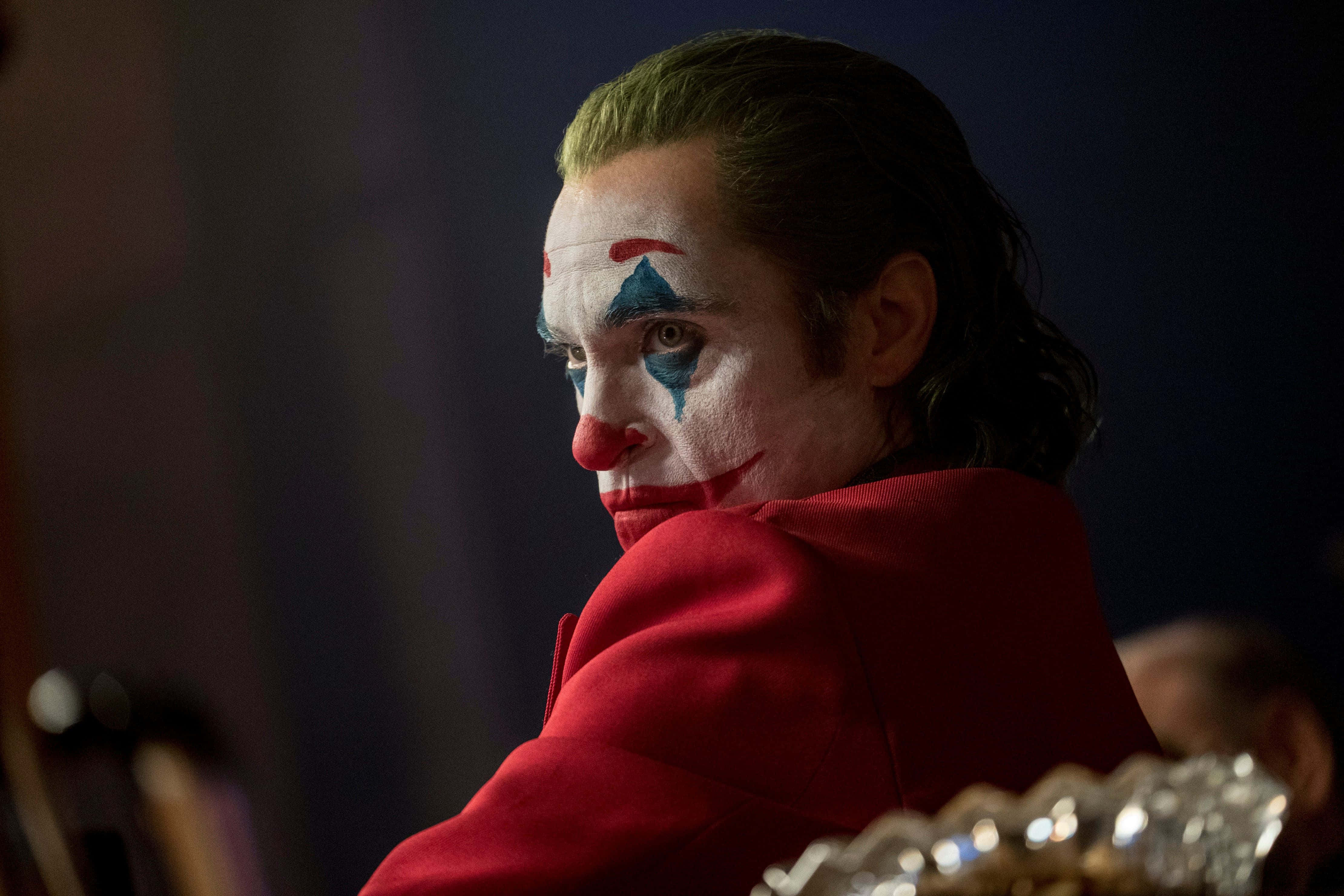 Joker, red suit, white face paint, 4K Desktop Wallpaper