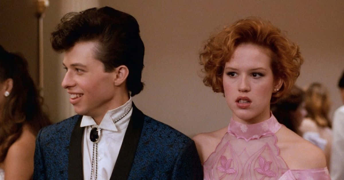 Jon Cryer, blue patterned tuxedo, pink dress, SD Desktop Wallpaper
