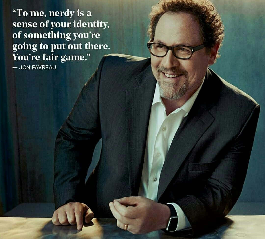 Jon Favreau, wooden table, textured blue background, SD Desktop Wallpaper