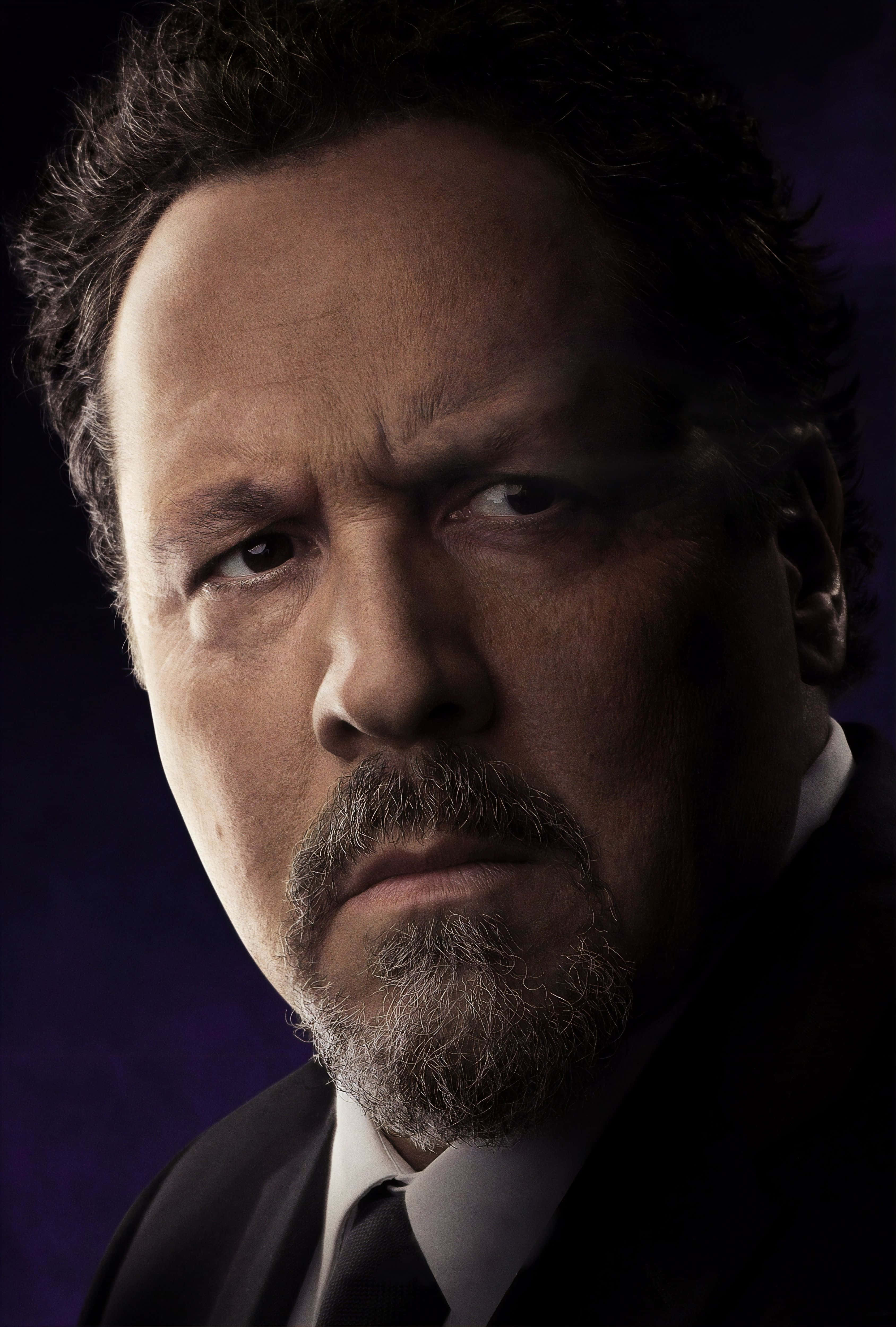 Jon Favreau, dark suit, deep purple backdrop, 4K Phone Wallpaper