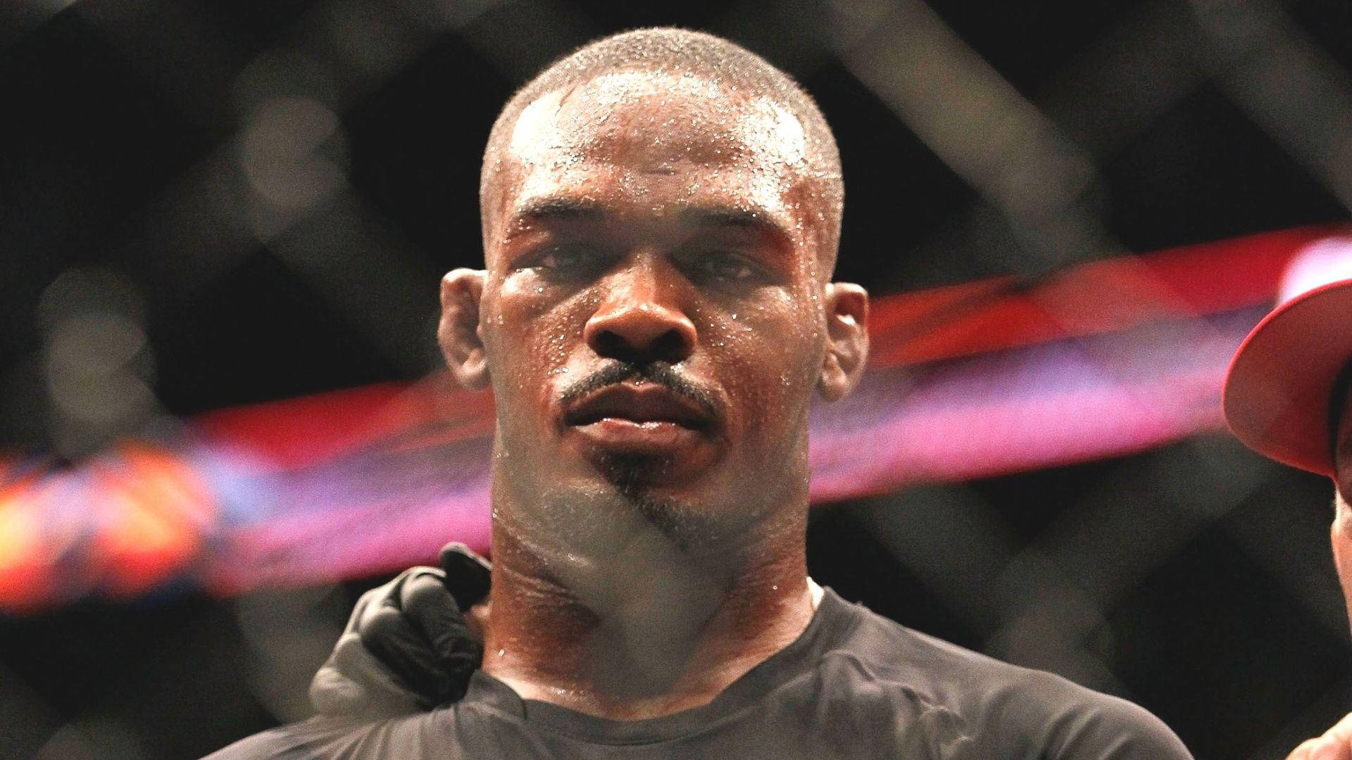 Jon Jones, MMA cage, dimly lit, Full HD Desktop Wallpaper