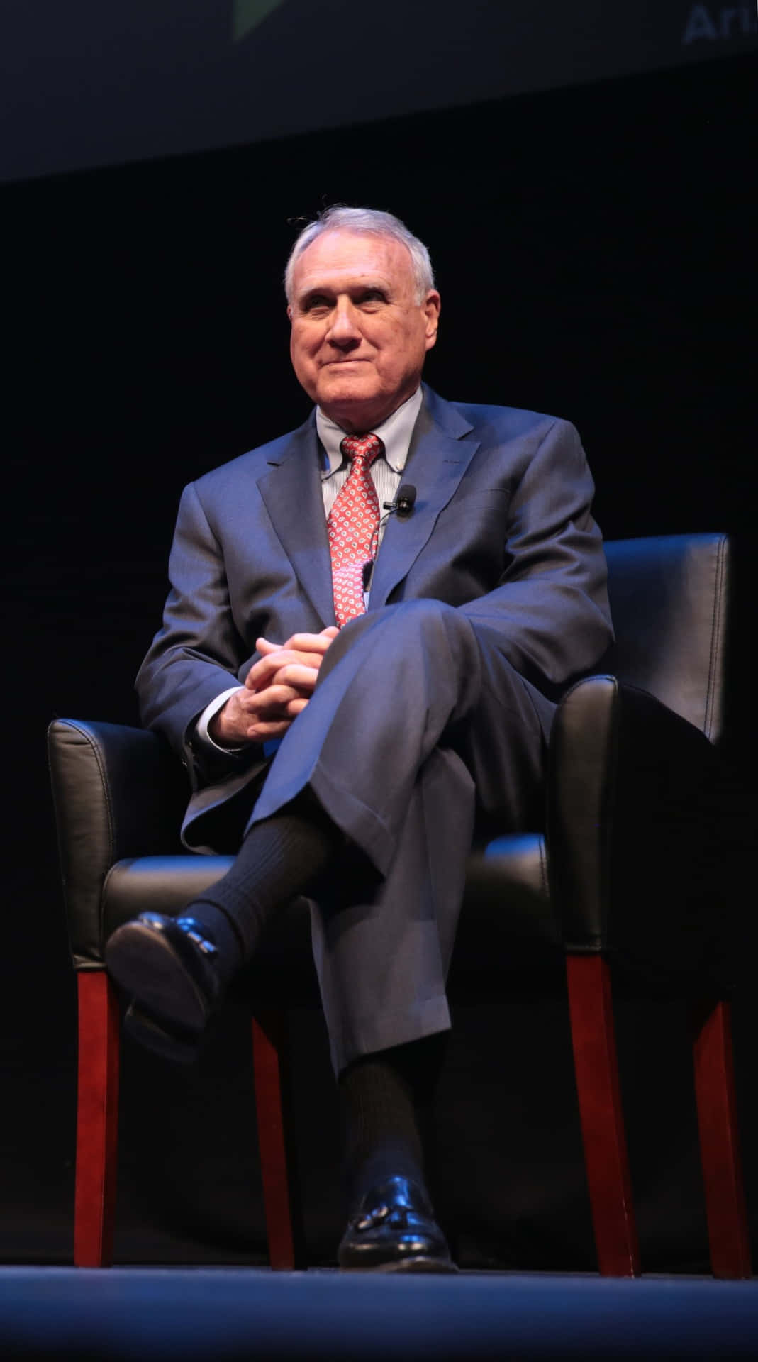 Jon Kyl, black chair, dimly lit stage, Full HD Phone Wallpaper
