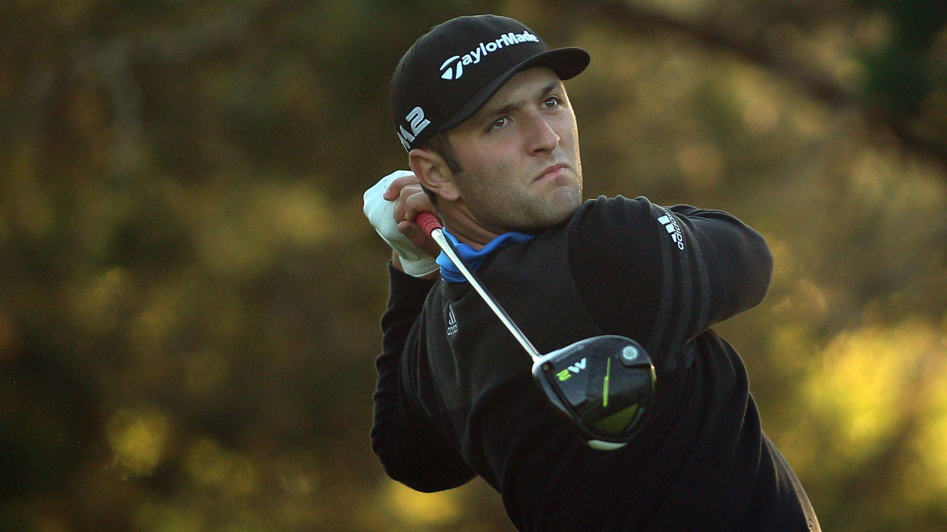 Jon Rahm, all black outfit, golden foliage, Full HD Desktop Wallpaper