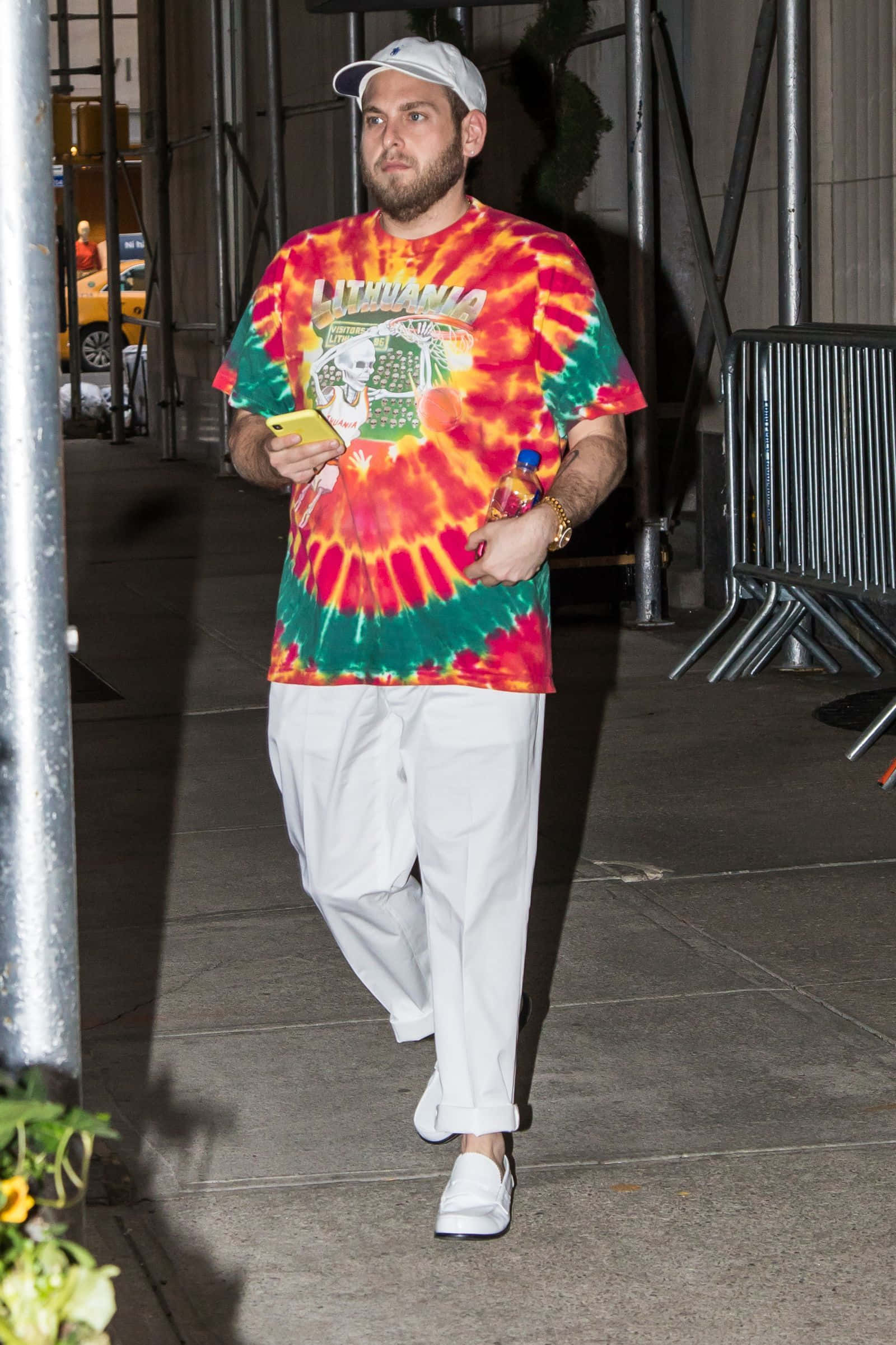 Jonah Hill, vibrant tie-dye shirt, white pants, Full HD Phone Wallpaper
