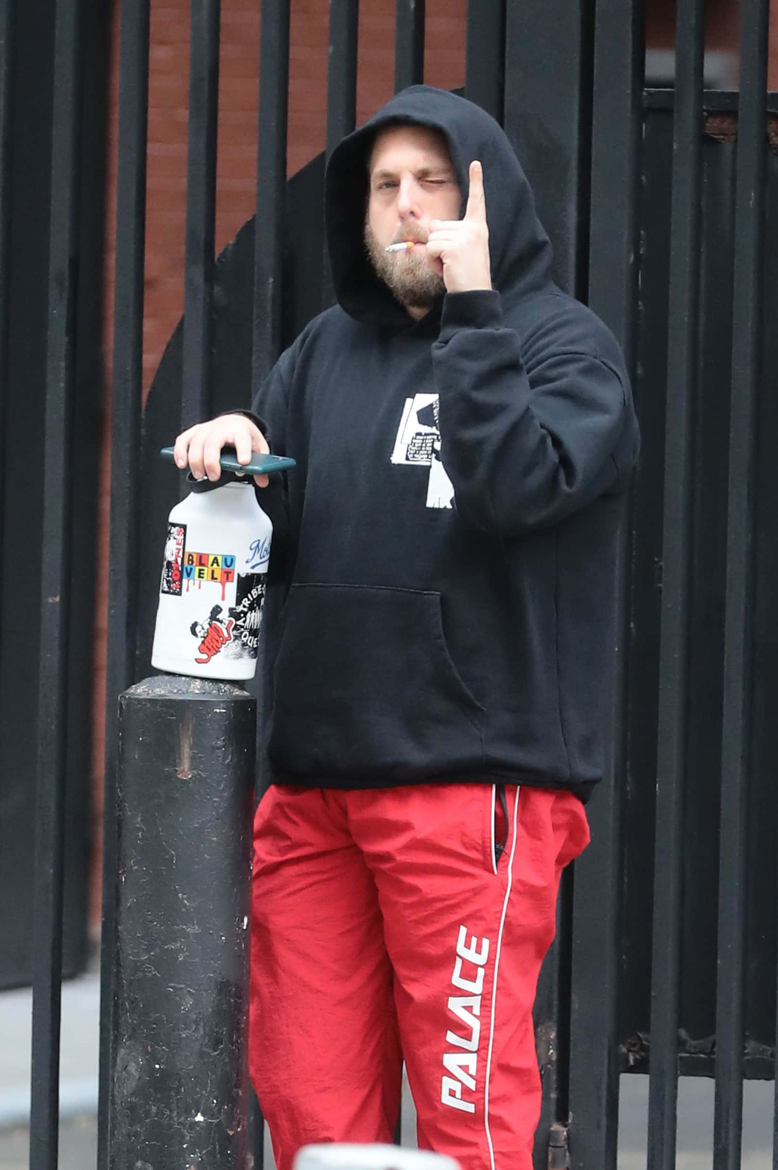 Jonah Hill, black hoodie, red Palace pants, Full HD Phone Wallpaper