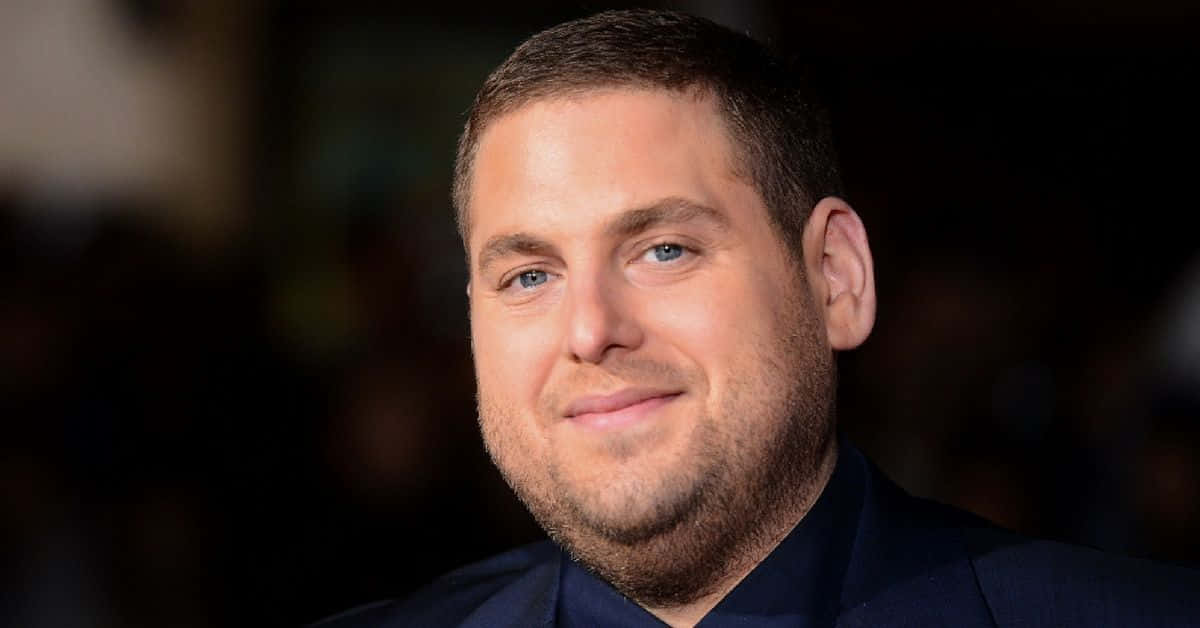 Jonah Hill, blue eyes, short dark hair, SD Desktop Wallpaper