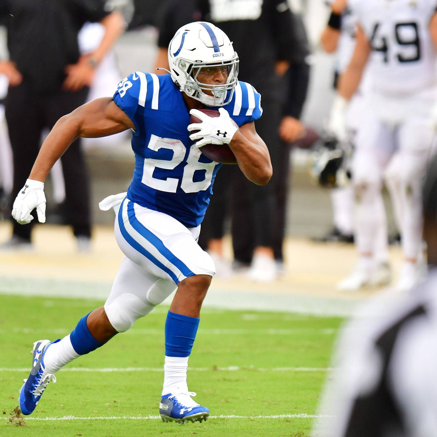 Jonathan Taylor, running back, blue and white uniform, HD Desktop Wallpaper