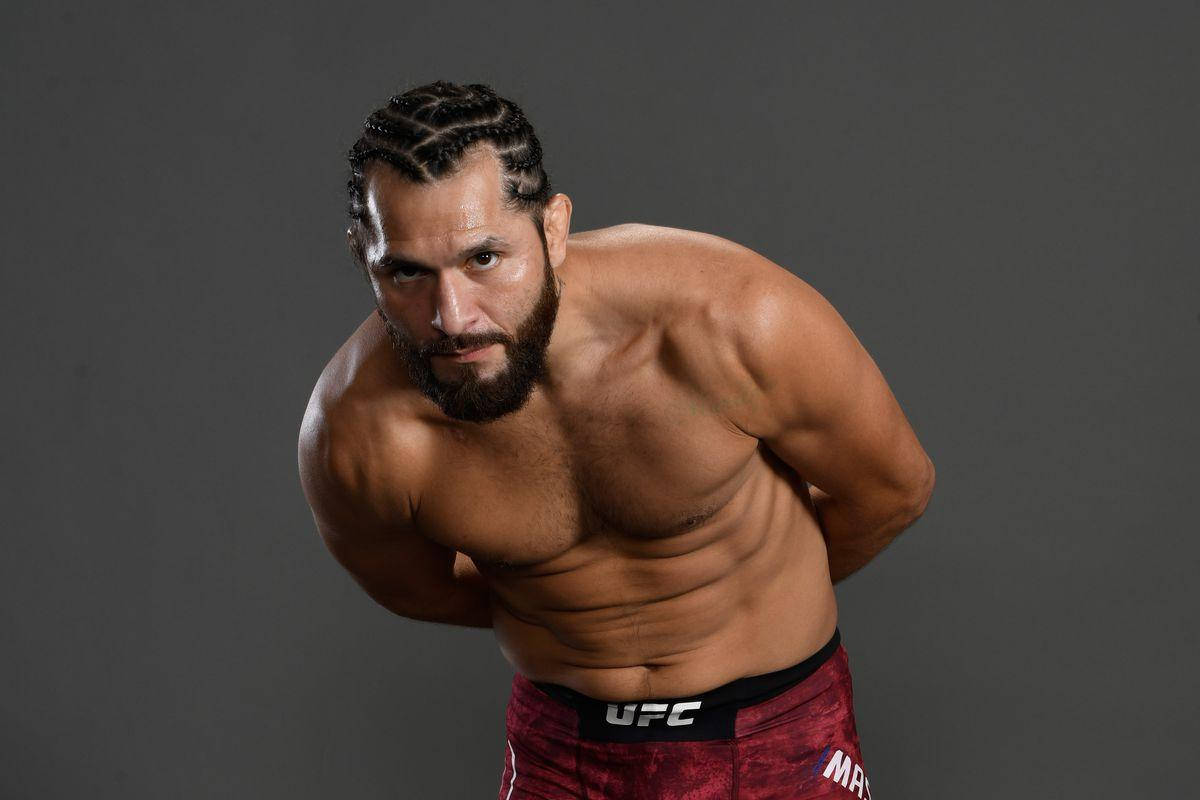 Jorge Masvidal, red UFC shorts, gray studio backdrop, SD Desktop Wallpaper